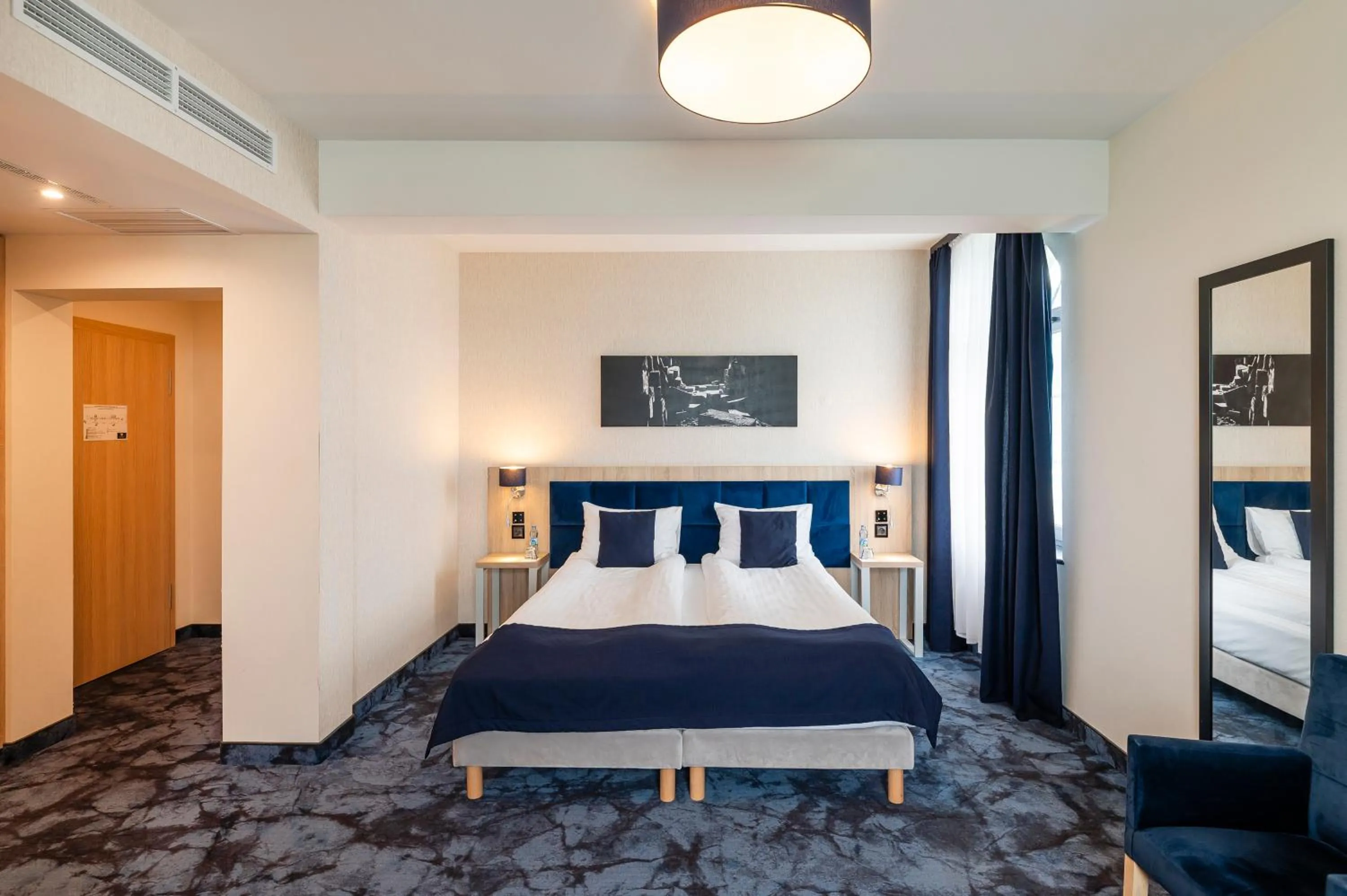 Bed in Ignasiak Hotel