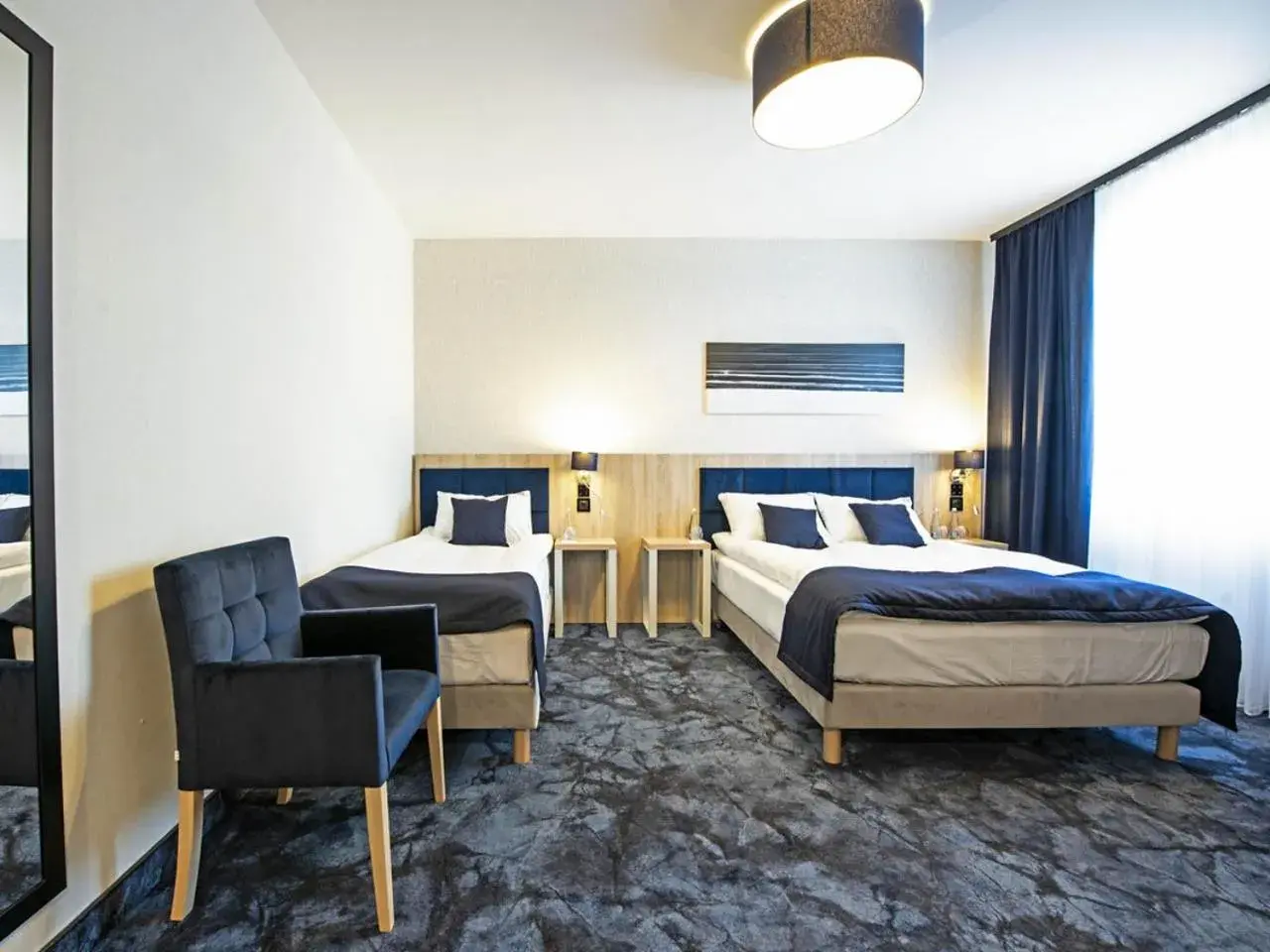 Standard Triple Room in Ignasiak Hotel Standard Triple Room in Ignasiak Hotel