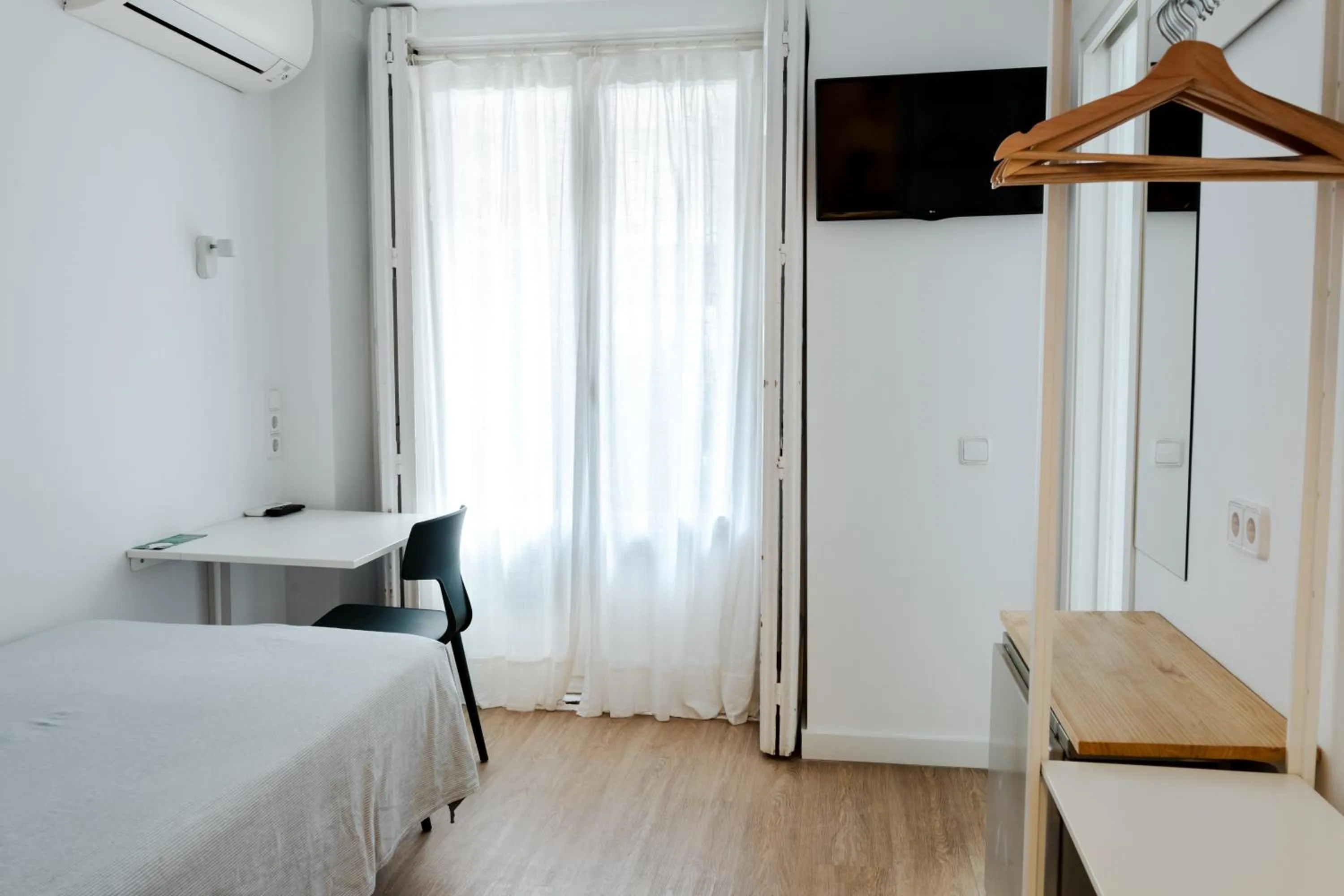 Photo of the whole room, Bed in Hostal La Zona