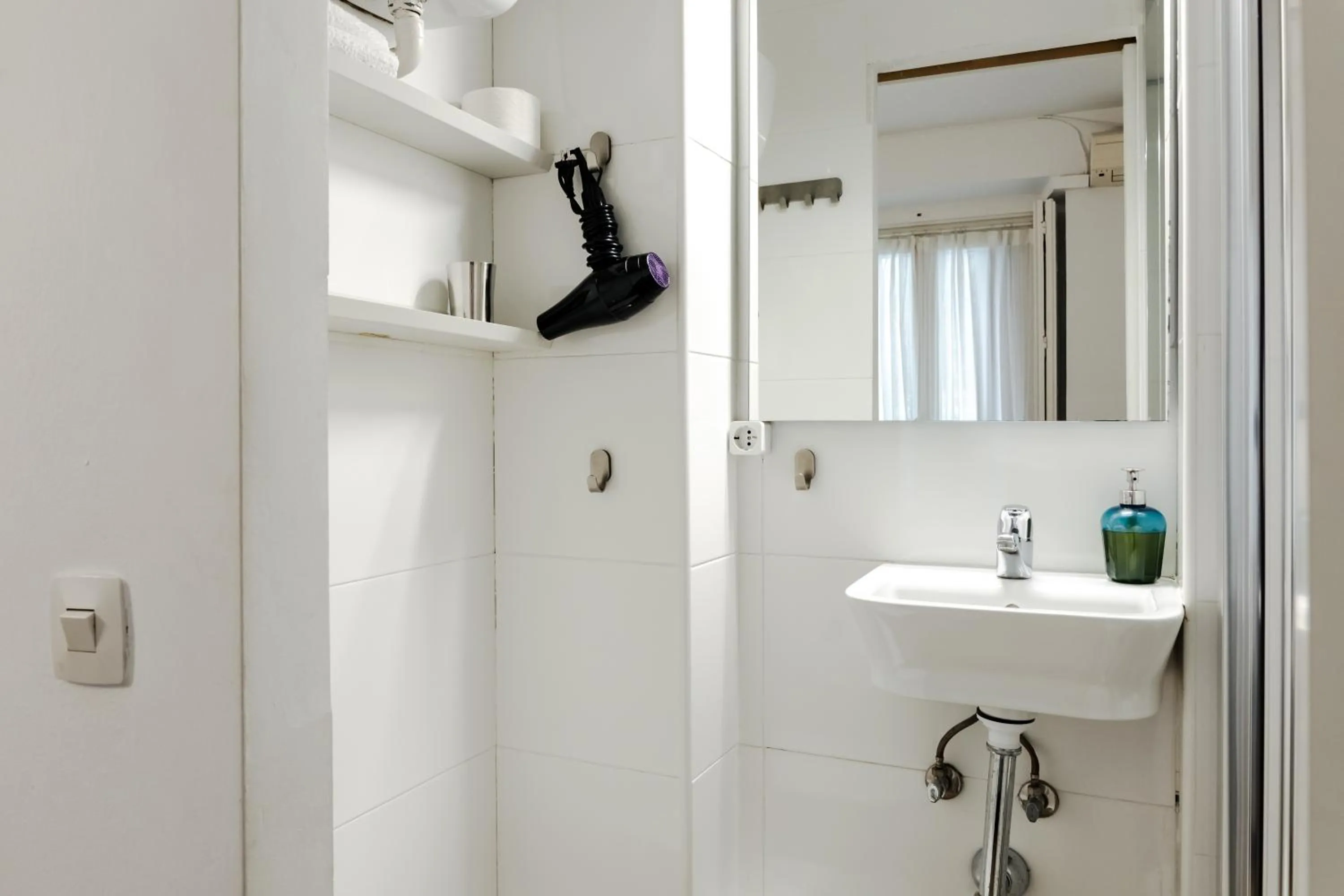 Bathroom in Hostal La Zona