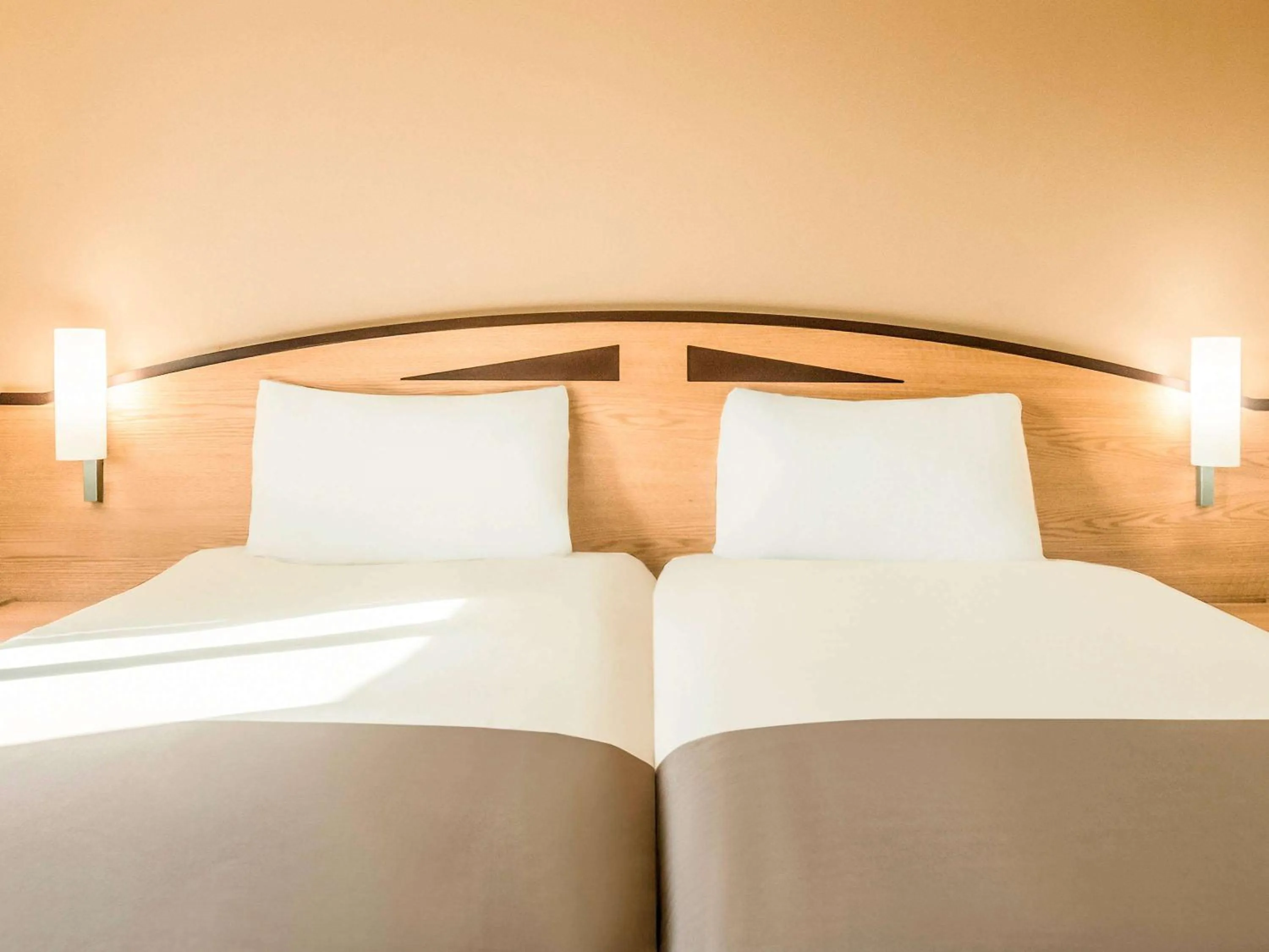 Bedroom in ibis Rotherham East – (M18 / M1)