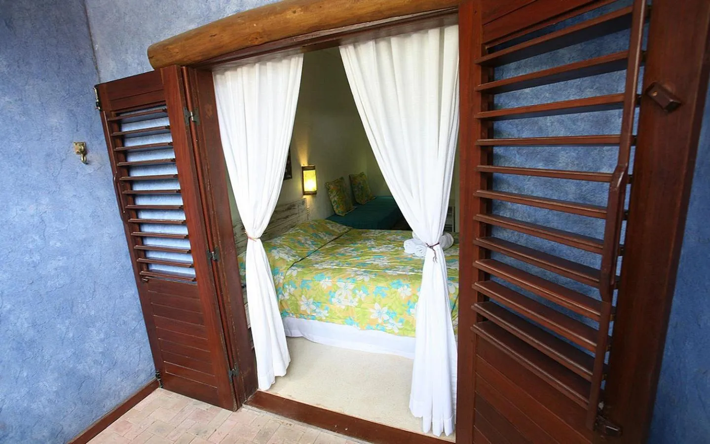 Bed in Pousada Rosa dos Ventos