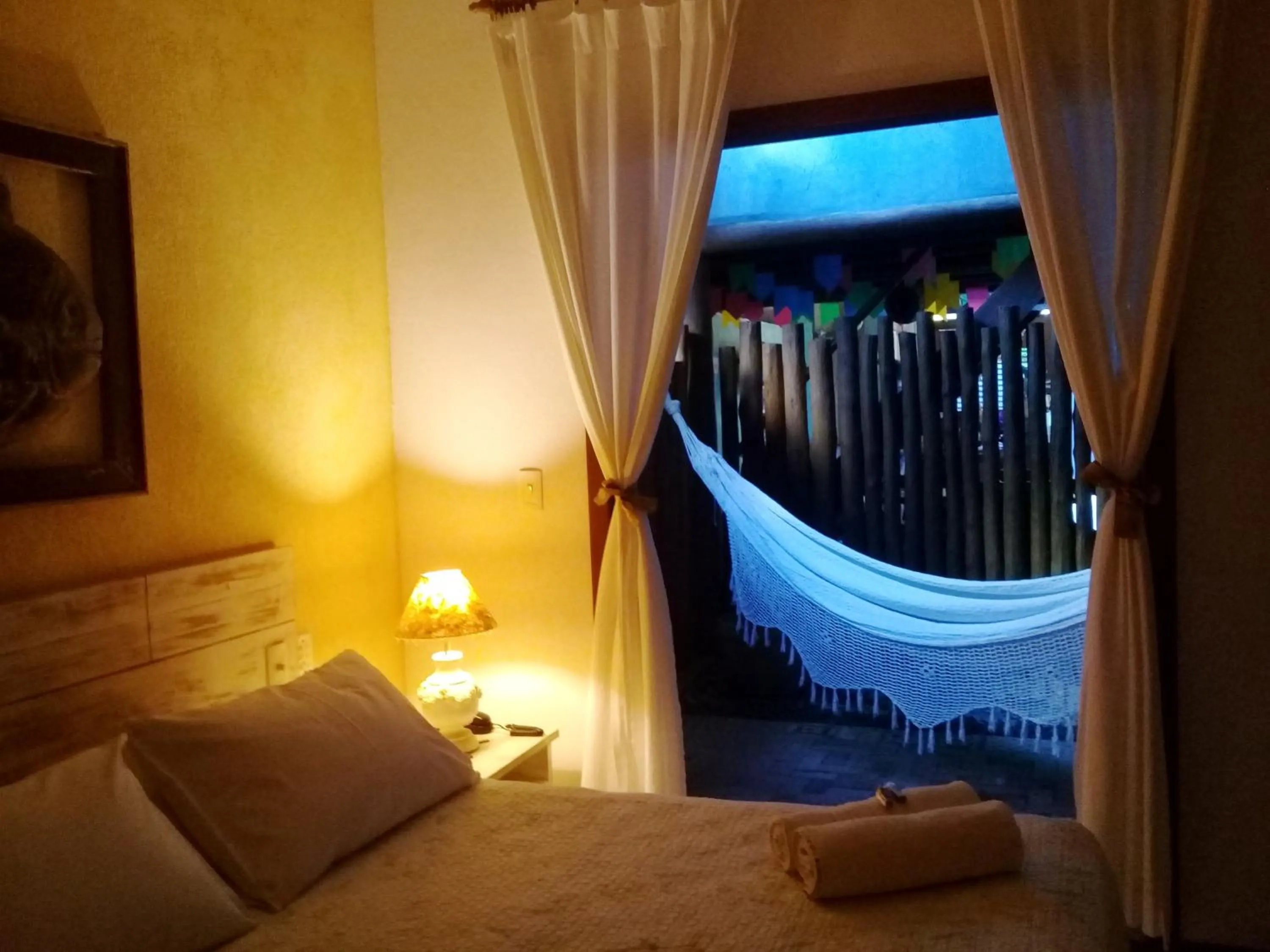 Bed in Pousada Rosa dos Ventos