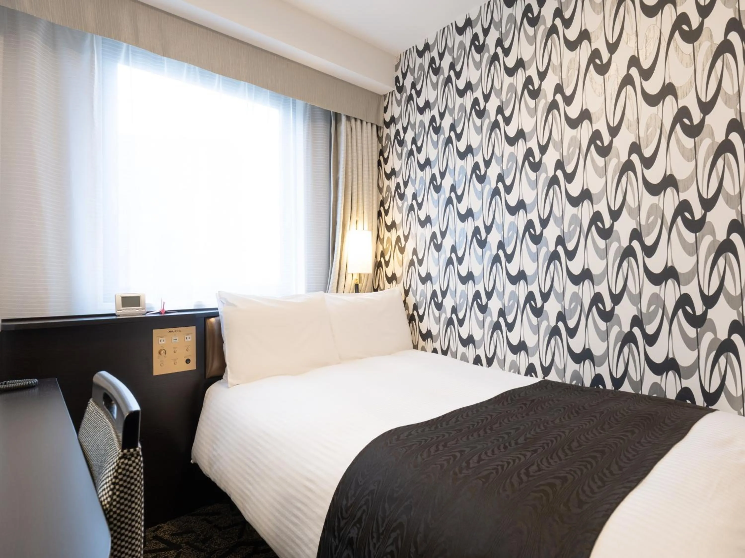 Photo of the whole room, Bed in APA Hotel Komatsu