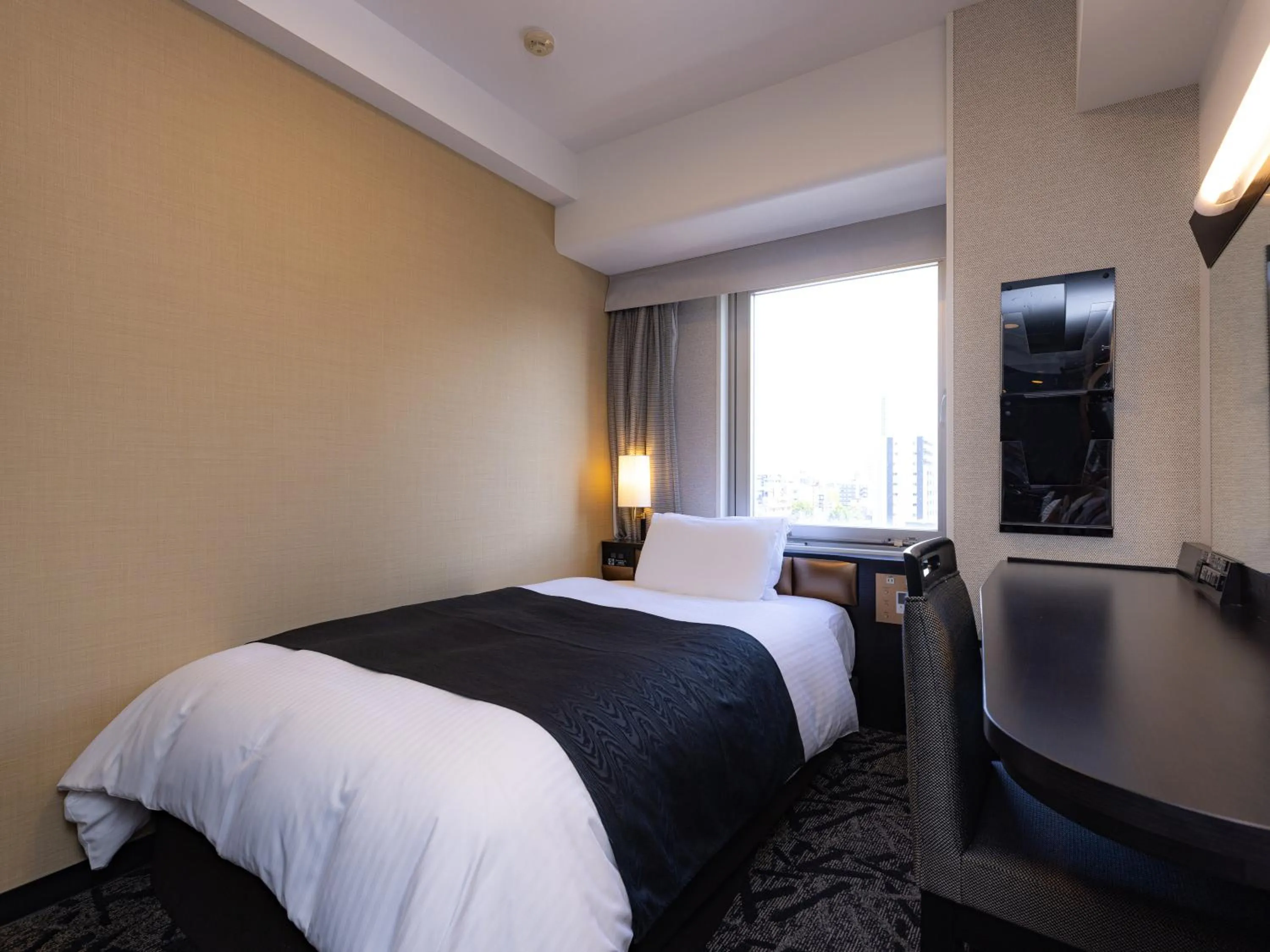 Photo of the whole room, Bed in APA Hotel Nagoya Sakae
