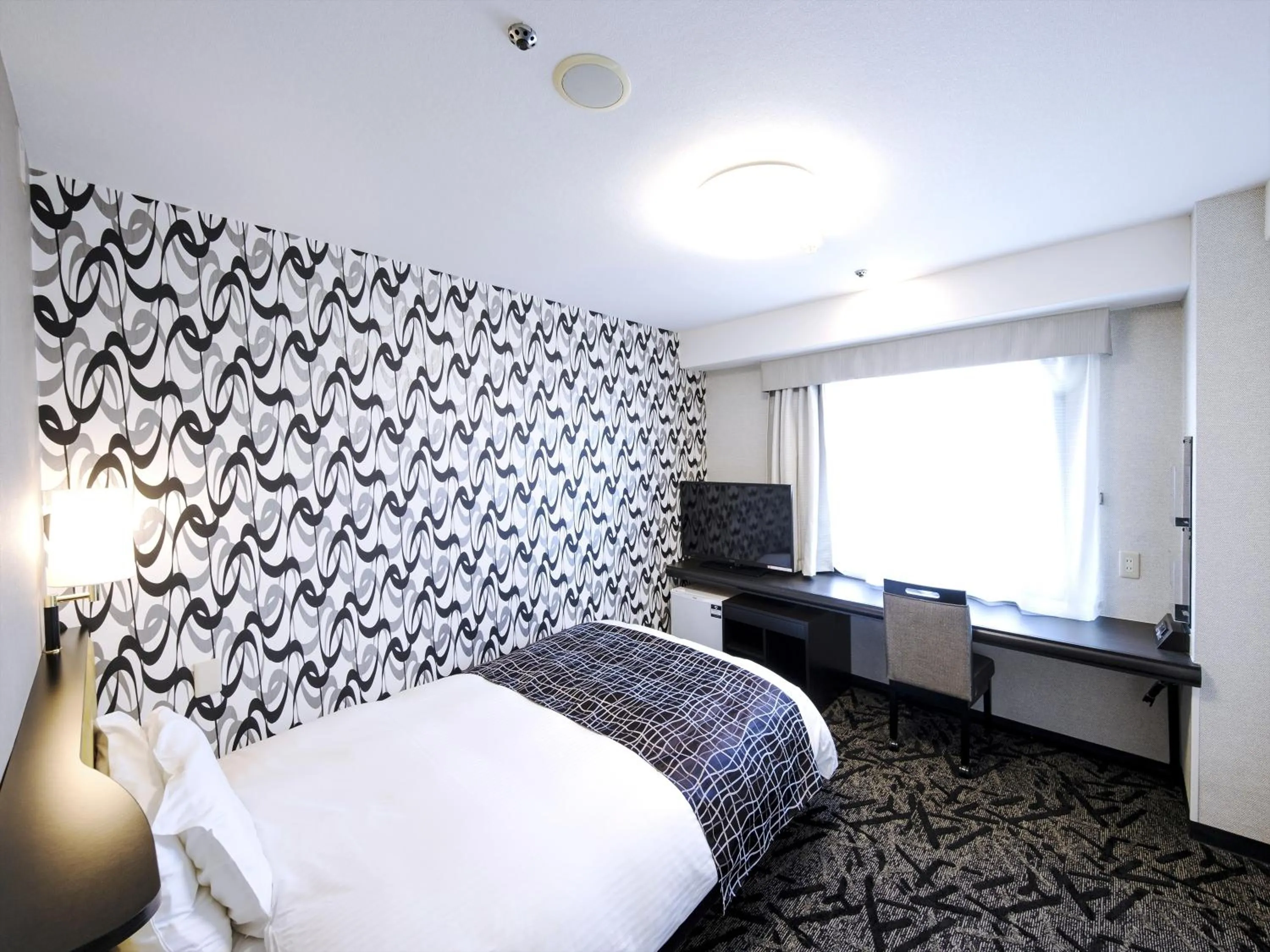 Photo of the whole room, Bed in APA Hotel Tottori Ekimae Minami