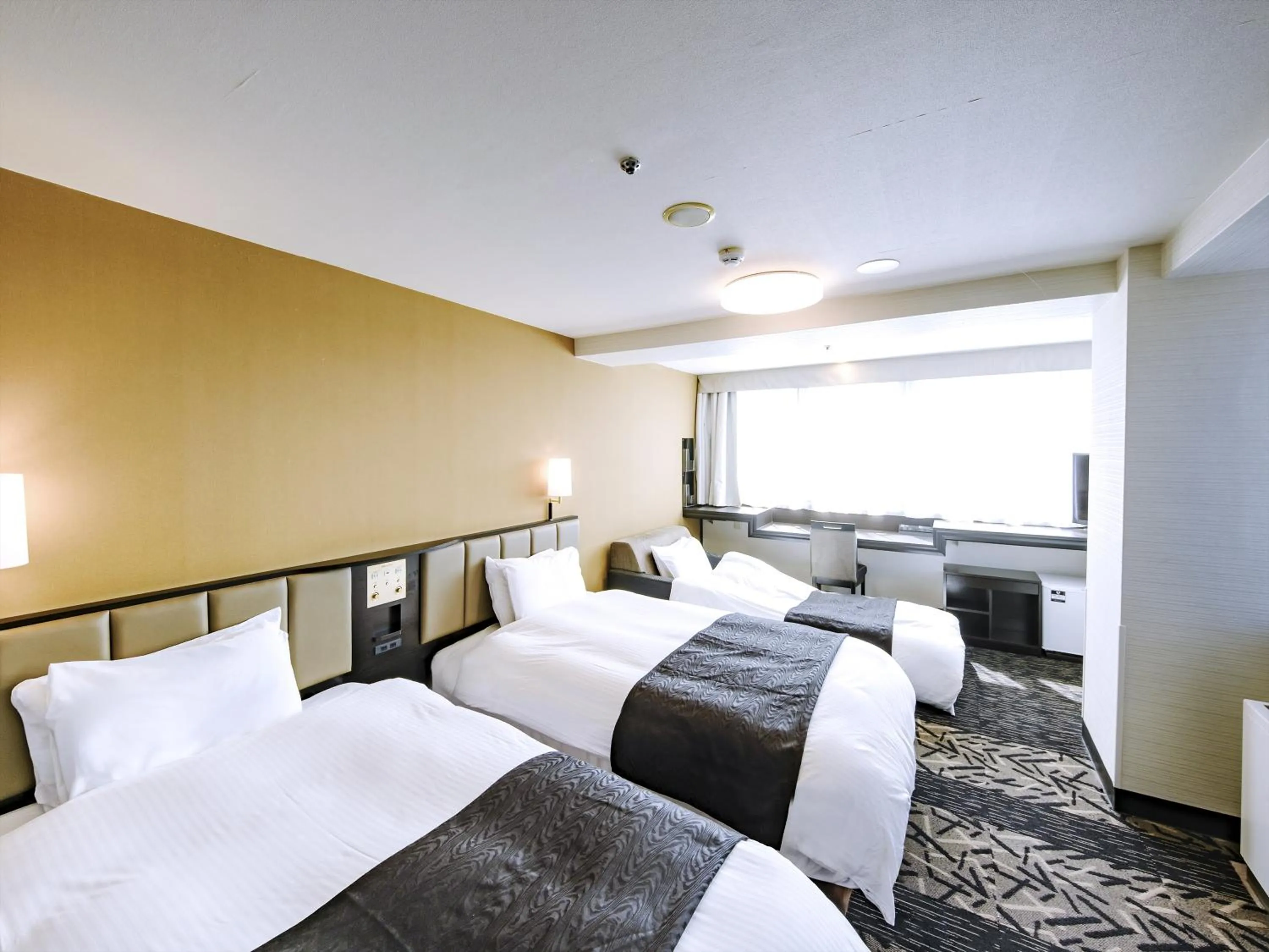 Photo of the whole room, Bed in APA Hotel Tottori Ekimae Minami