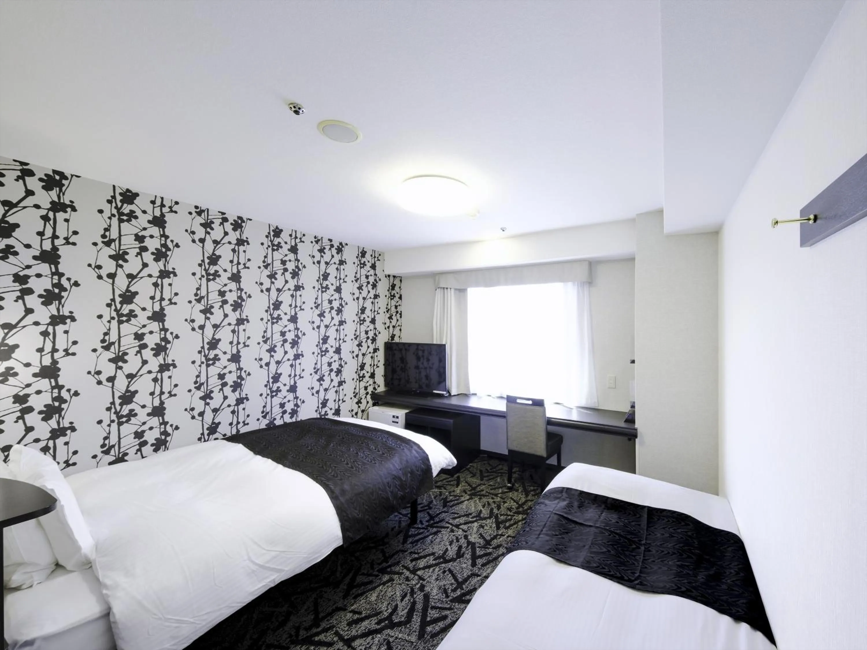 Photo of the whole room, Bed in APA Hotel Tottori Ekimae Minami