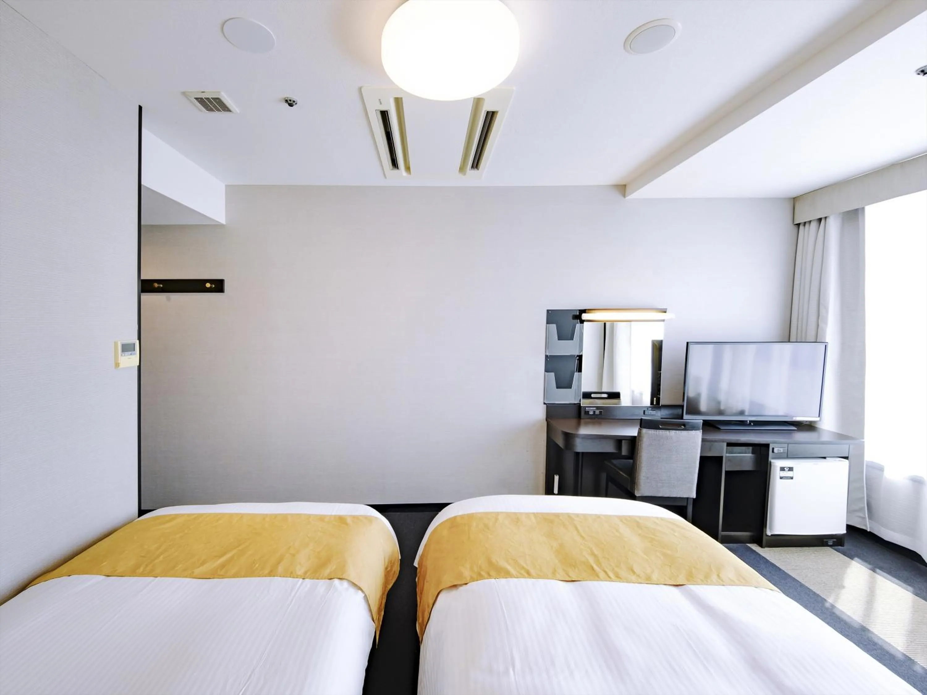 Photo of the whole room, Bed in APA Hotel Tottori Ekimae Minami