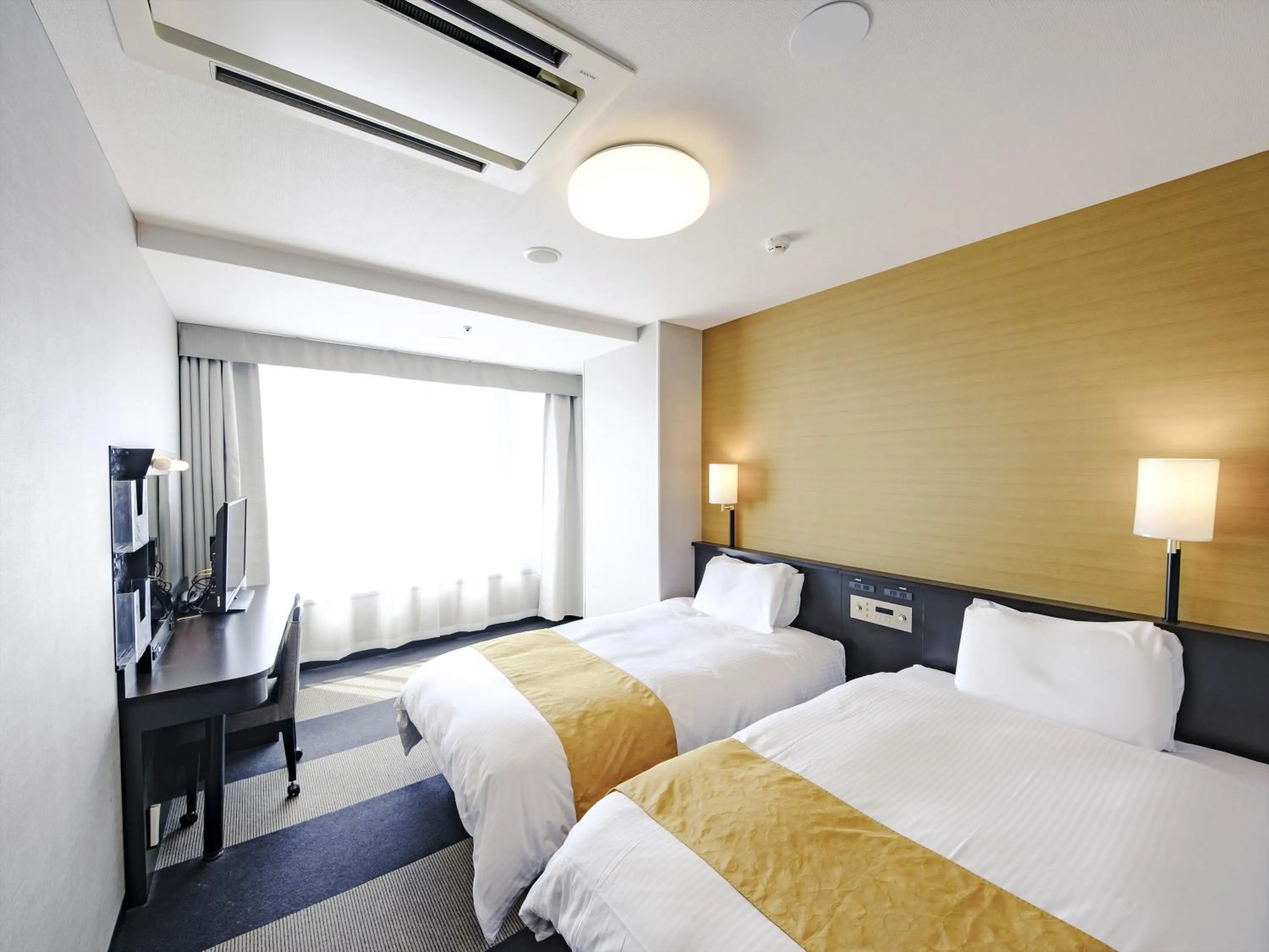 Photo of the whole room, Bed in APA Hotel Tottori Ekimae Minami