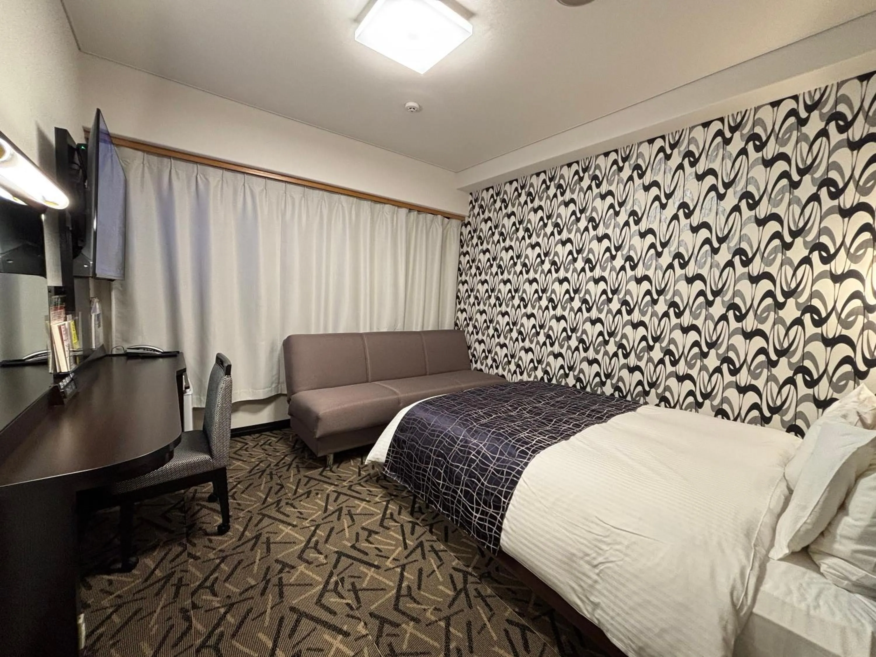 Bed in APA Hotel Kitakami Ekinishi