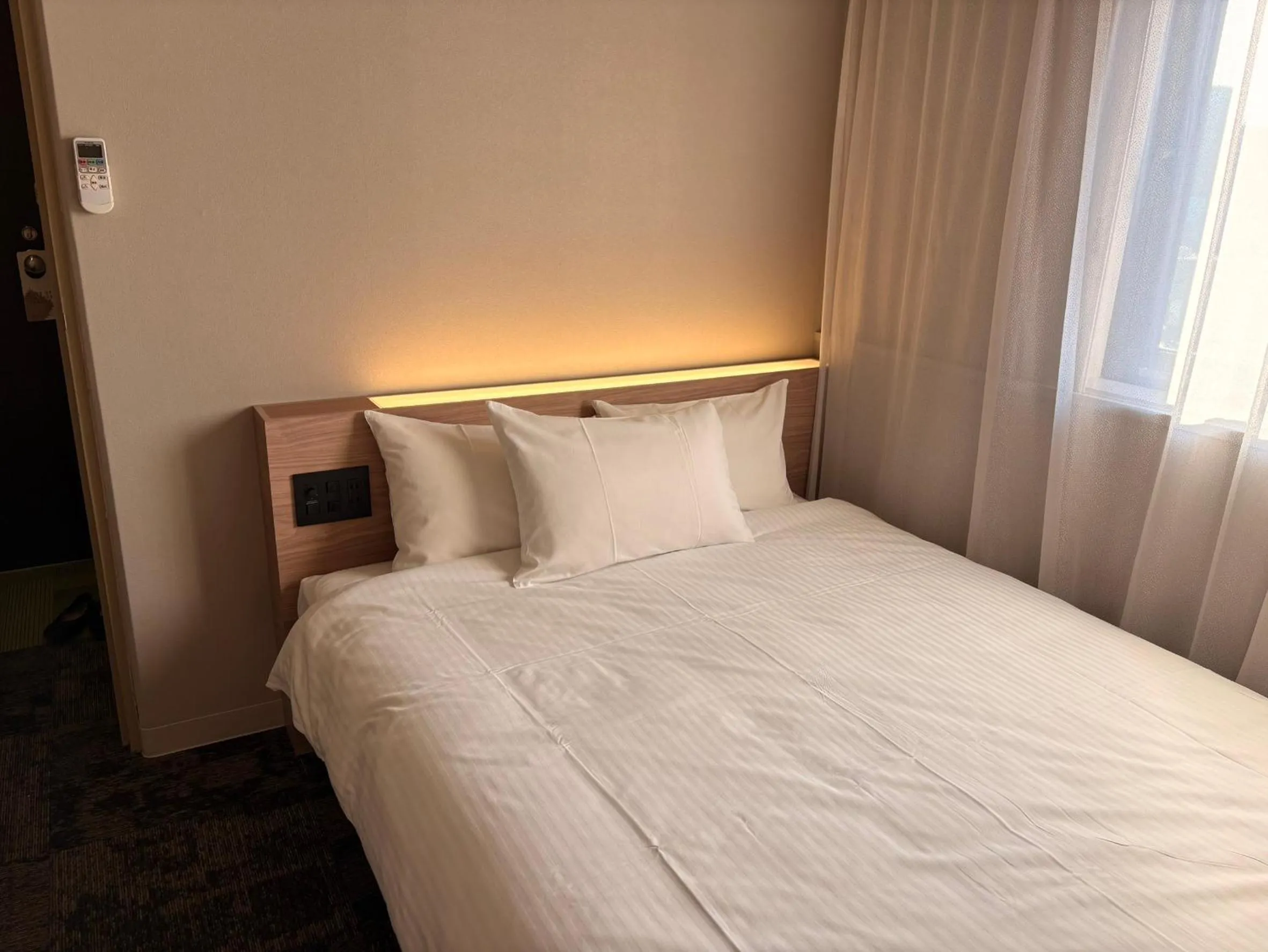 Photo of the whole room, Bed in Tabist Hotel Tetora Kitakyushu