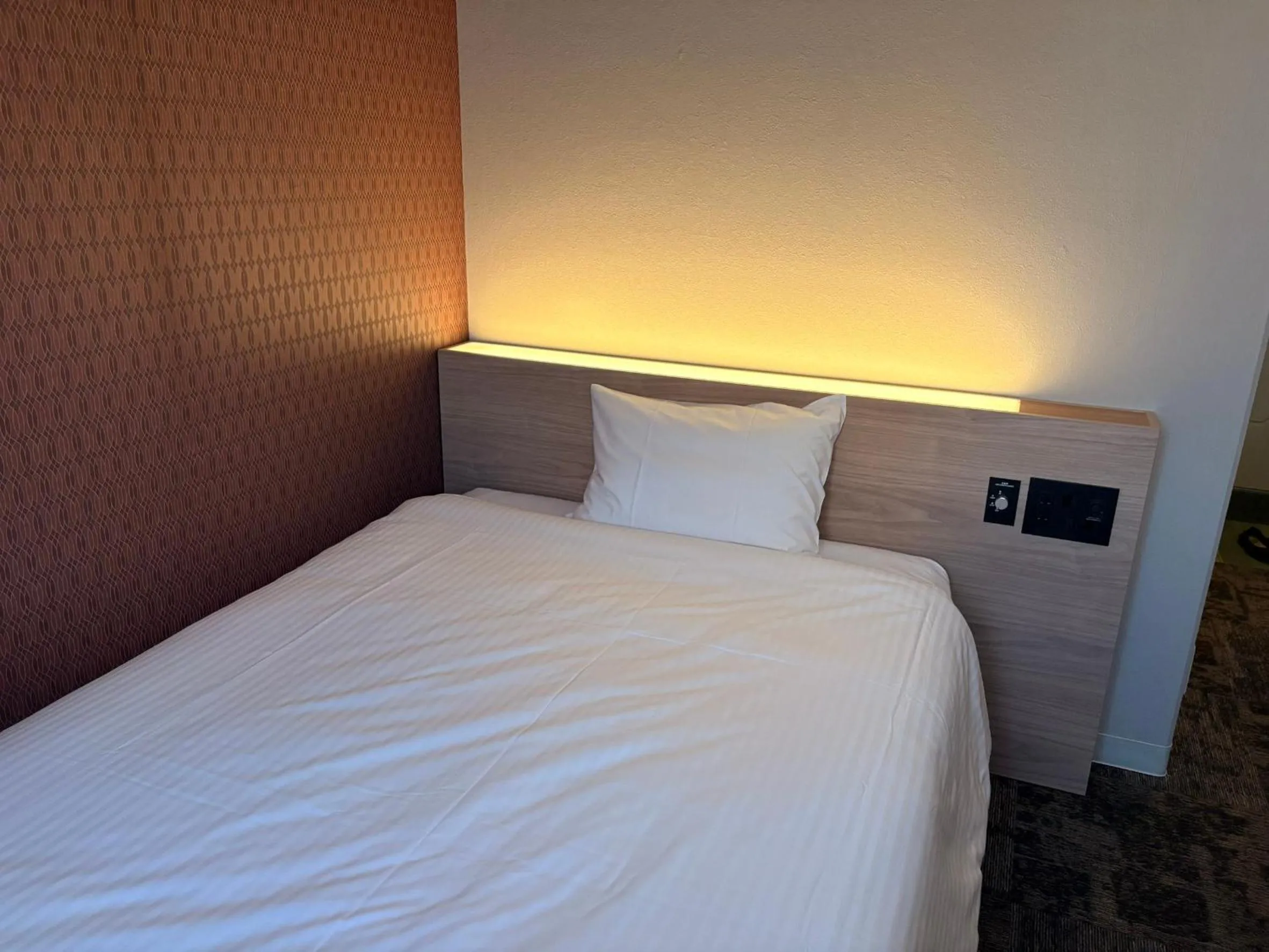Photo of the whole room, Bed in Tabist Hotel Tetora Kitakyushu