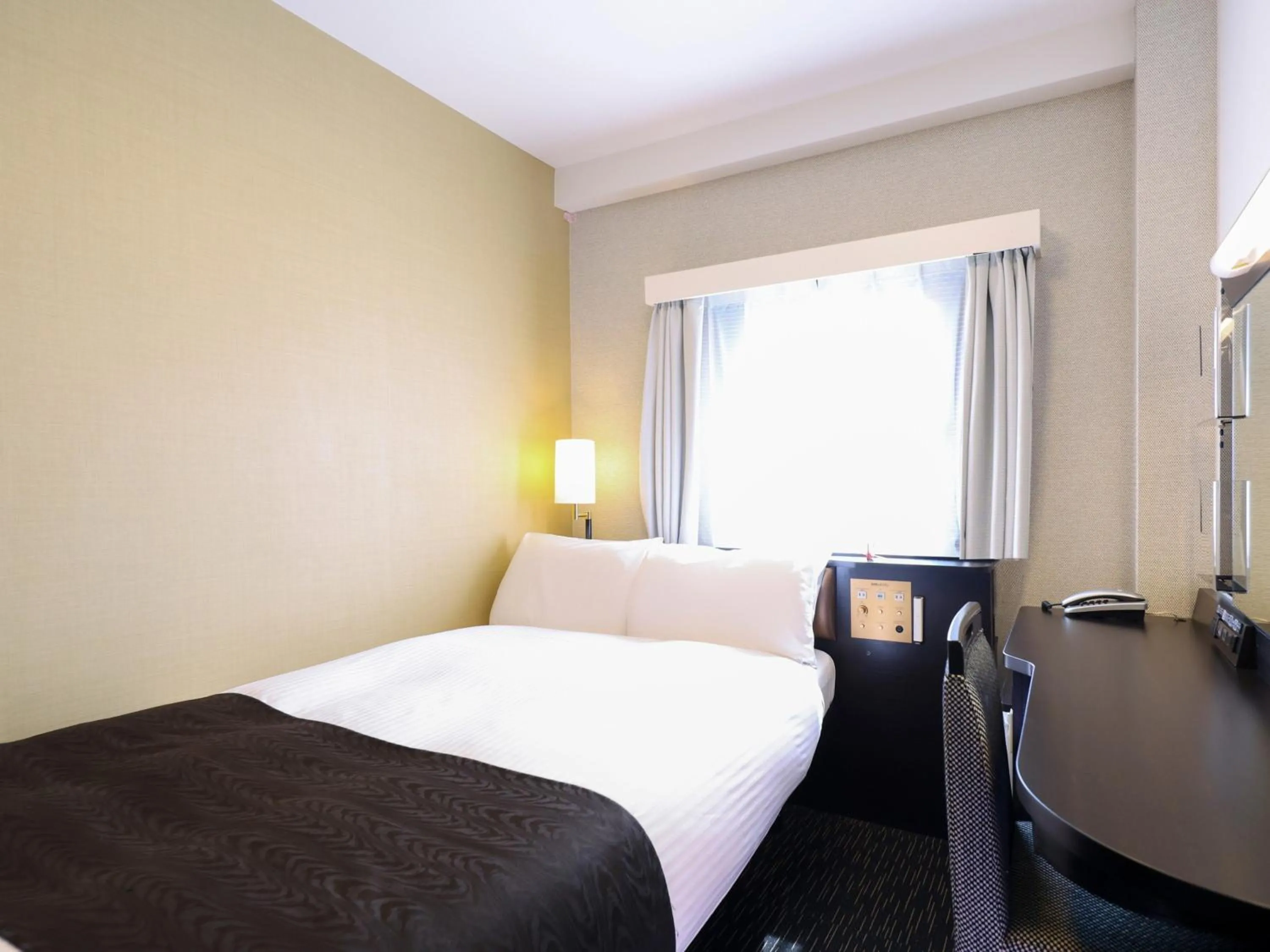 Photo of the whole room, Bed in APA Hotel Ogaki Ekimae