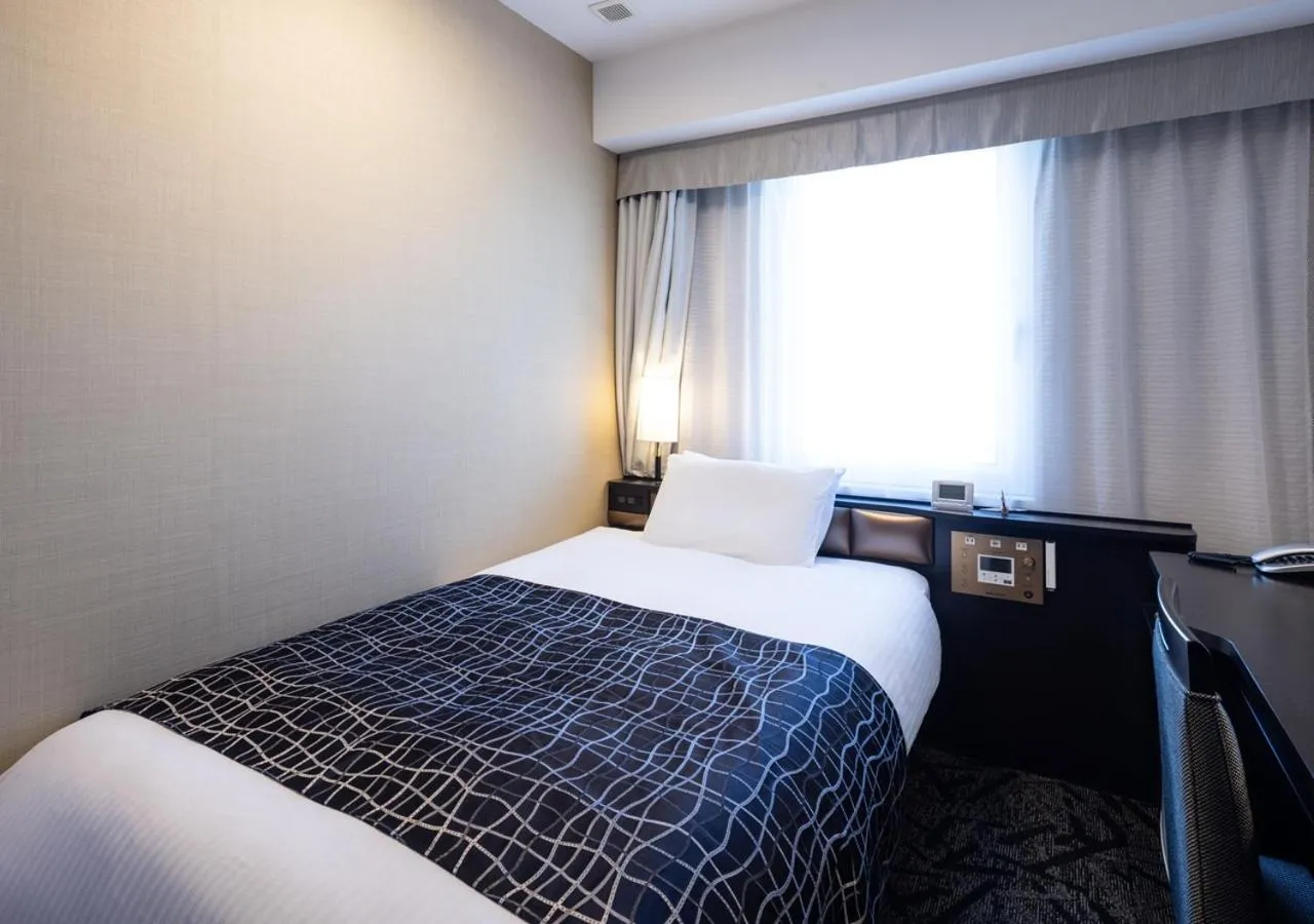 Photo of the whole room, Bed in APA Hotel Niigata Furumachi