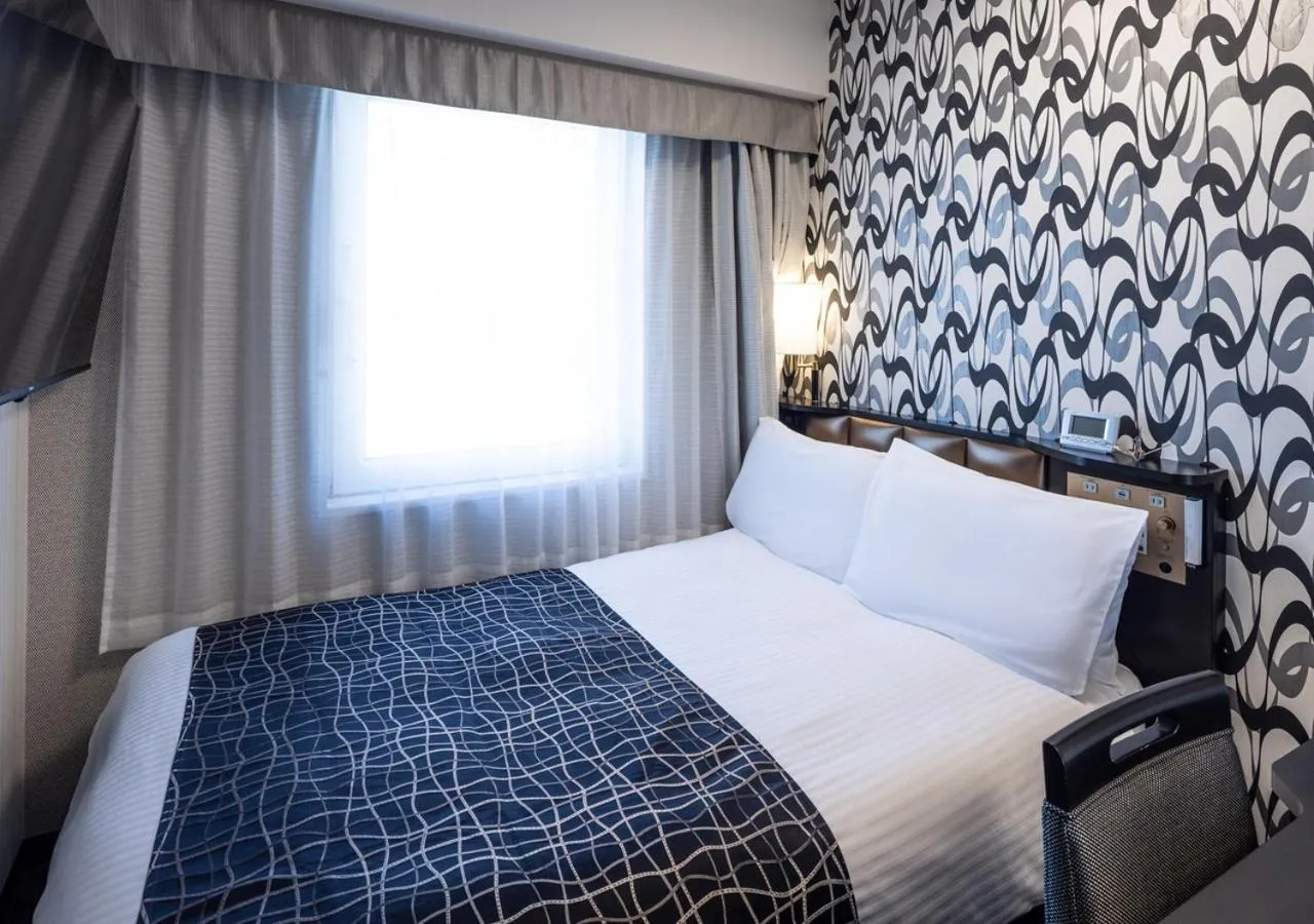Photo of the whole room, Bed in APA Hotel Niigata Furumachi