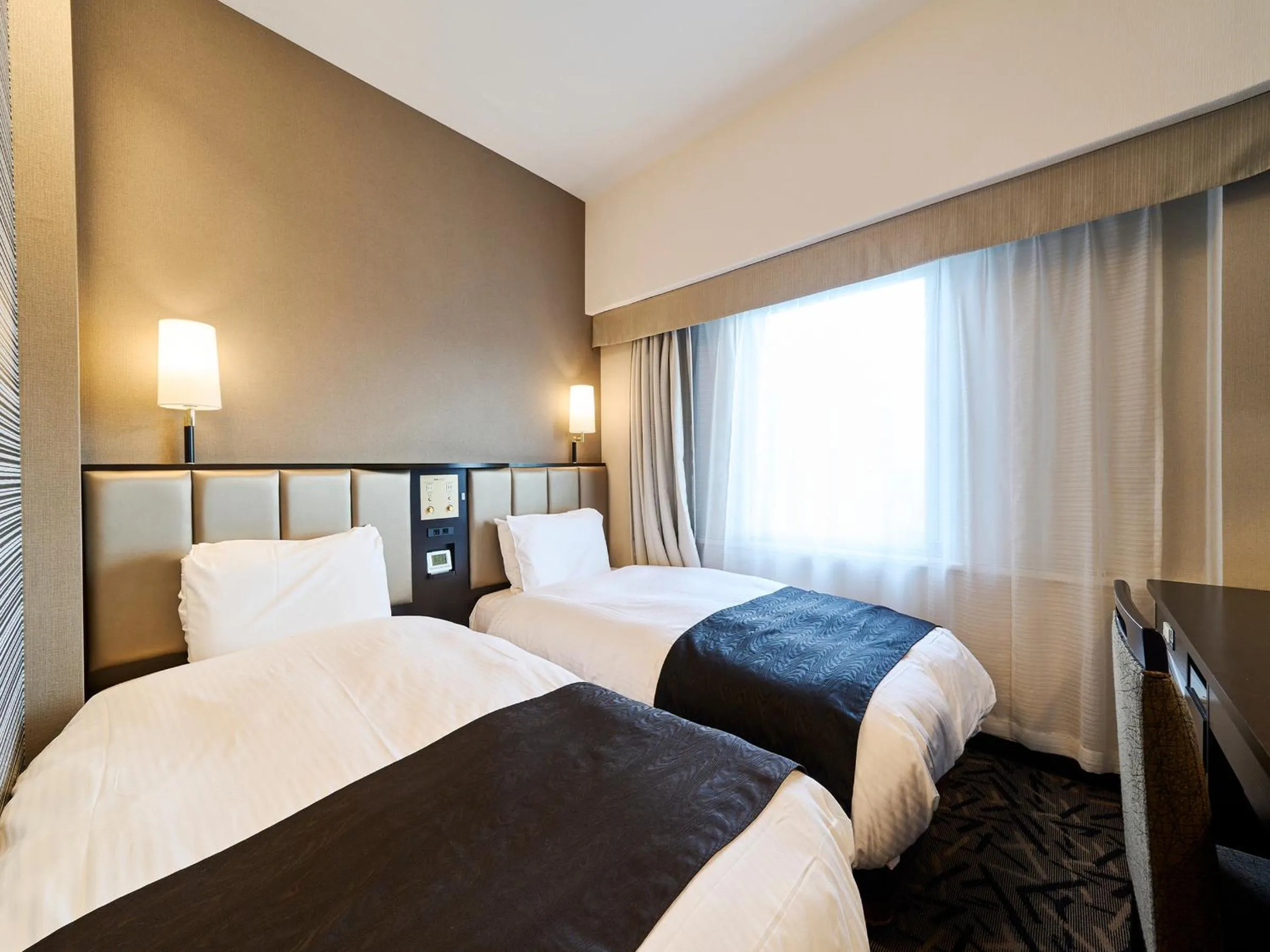 Bed in APA Hotel Takaoka Marunouchi