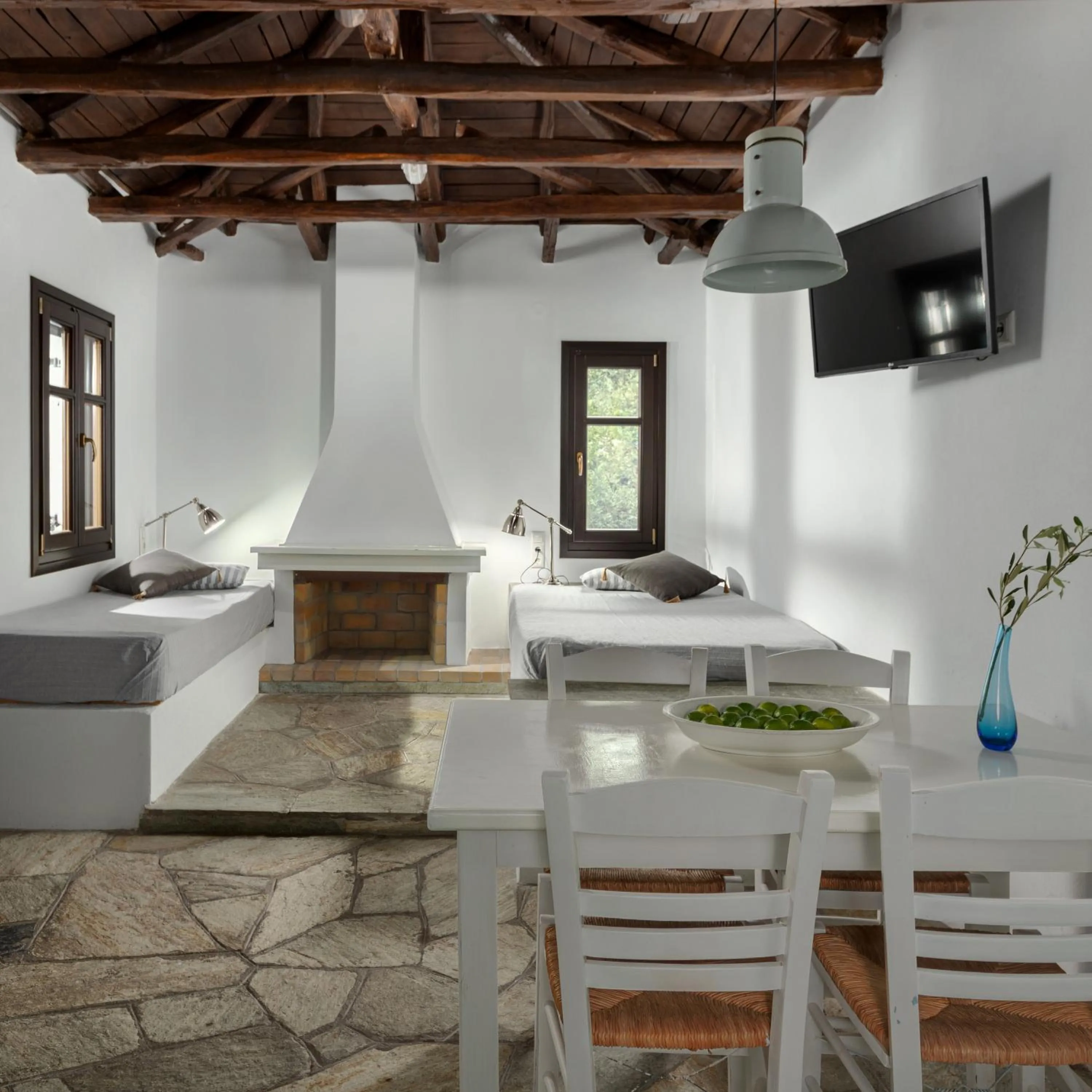 Seating area, Bed in Aeolos Hotel & Villas - Pelion