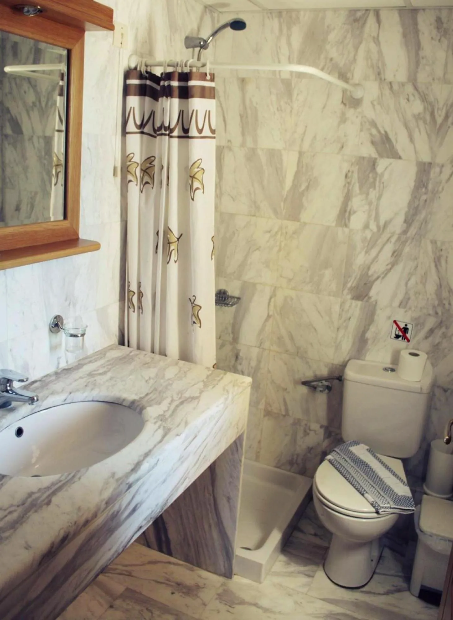 Bathroom in Mythos Beach Hotel Apartments