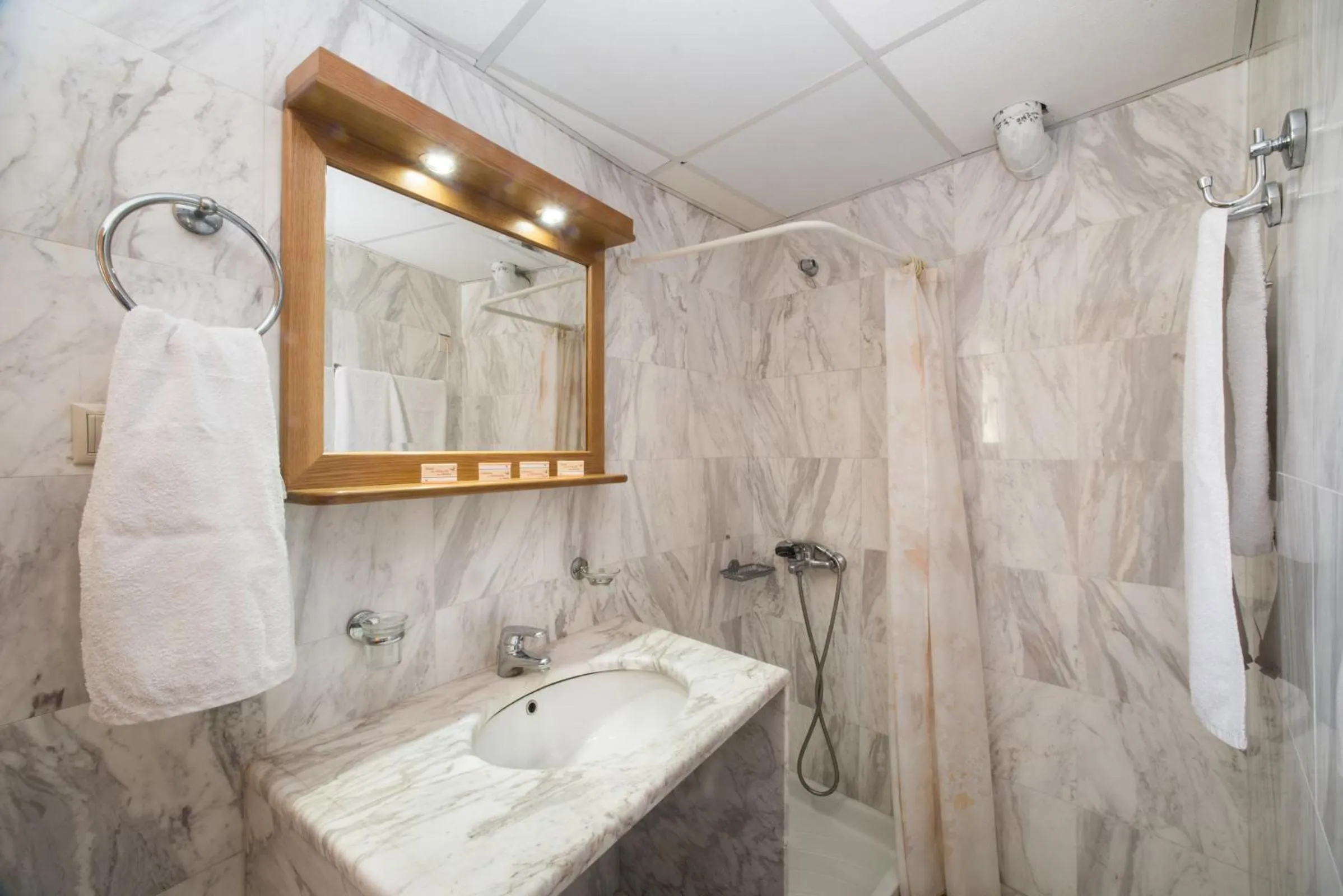Shower in Mythos Beach Hotel Apartments