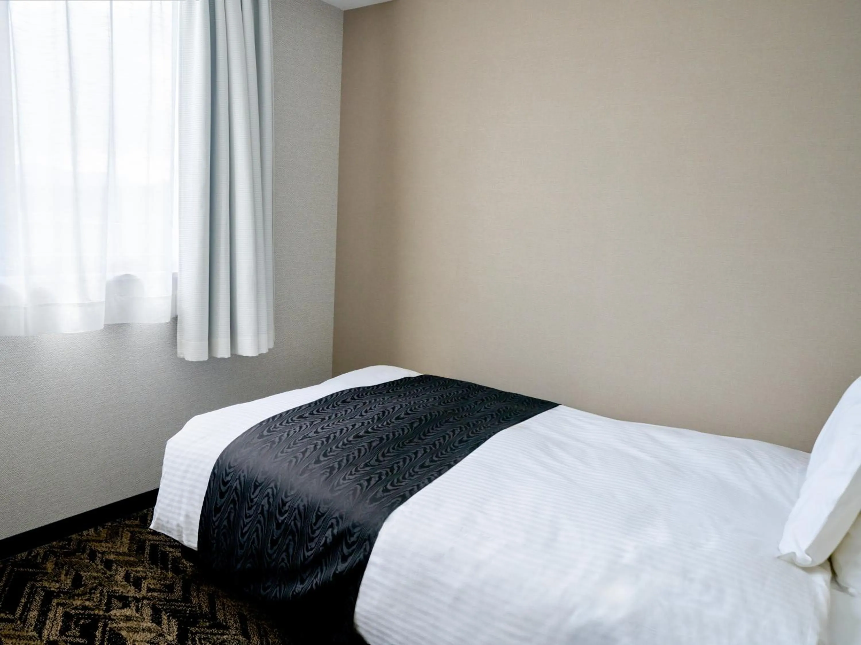 Photo of the whole room, Bed in APA Hotel Takamatsu Airport