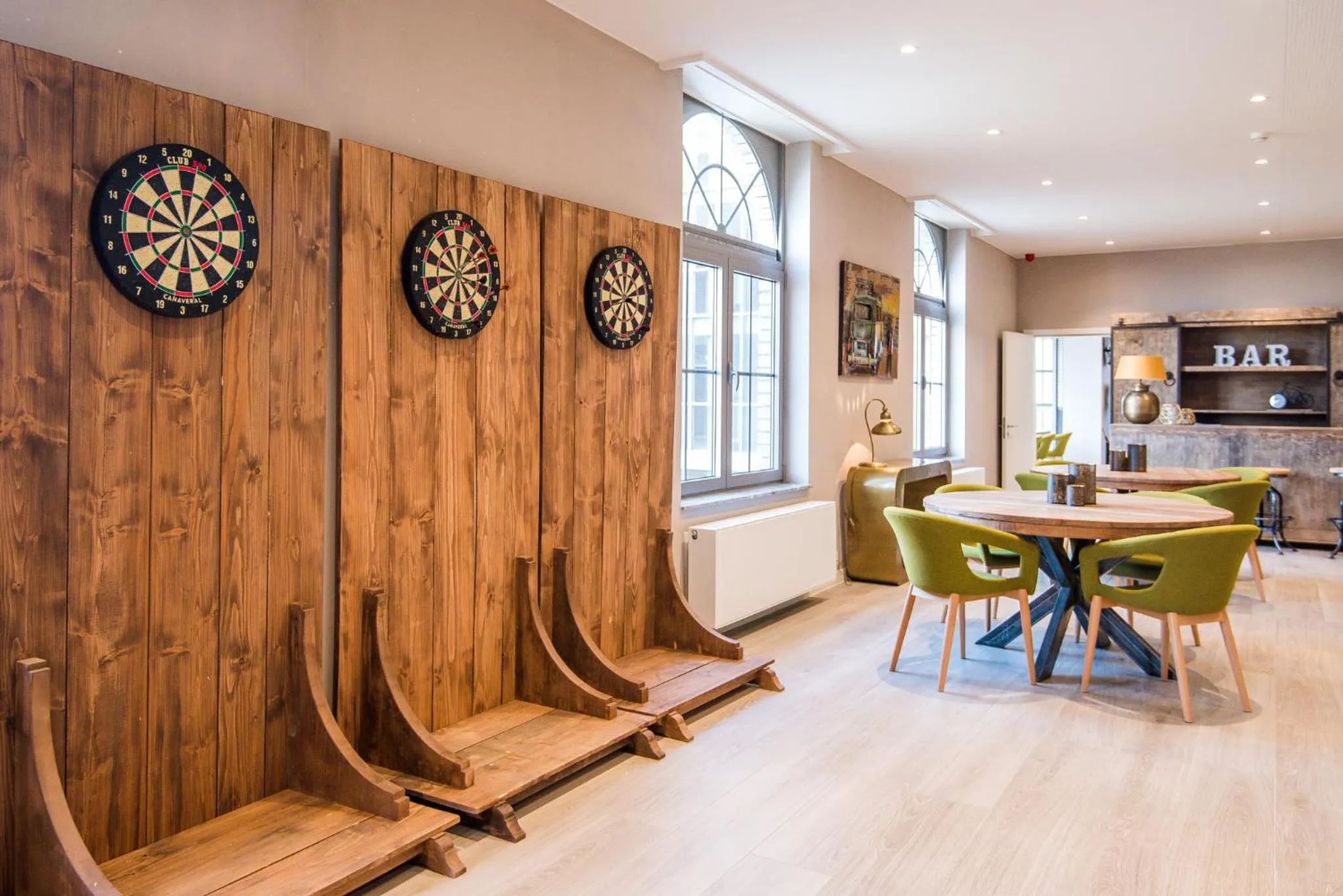 Communal lounge/ TV room in Hotel Acropolis " Op het sportiefste park van de kust "