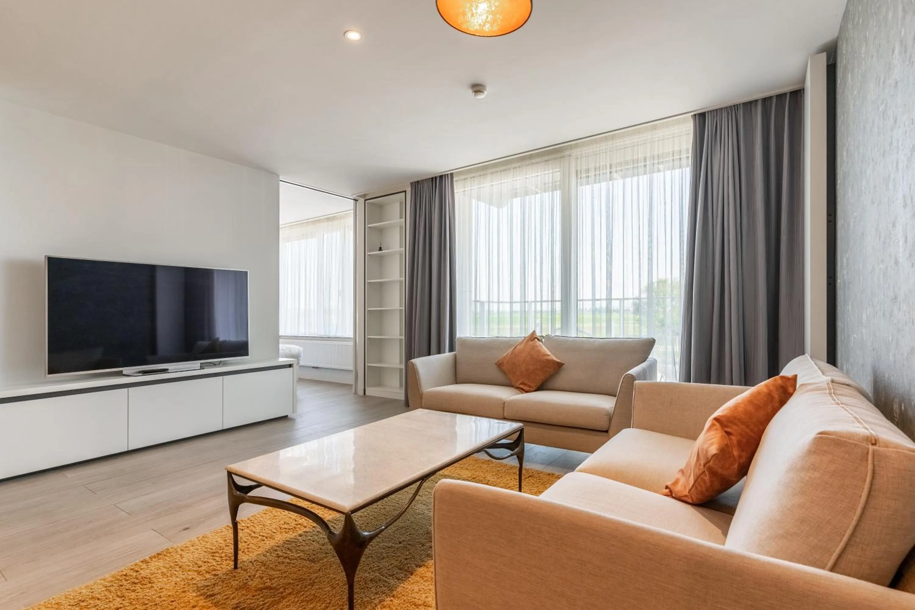 Living room in Hotel Acropolis " Op het sportiefste park van de kust "