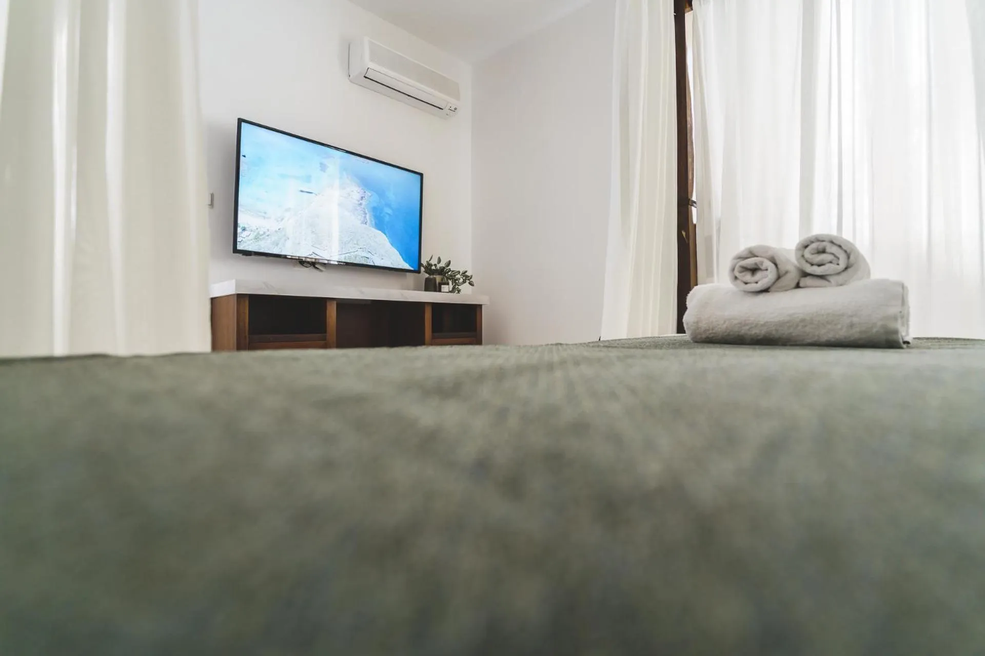 Bed in Zeus Village Resort - Adults Only