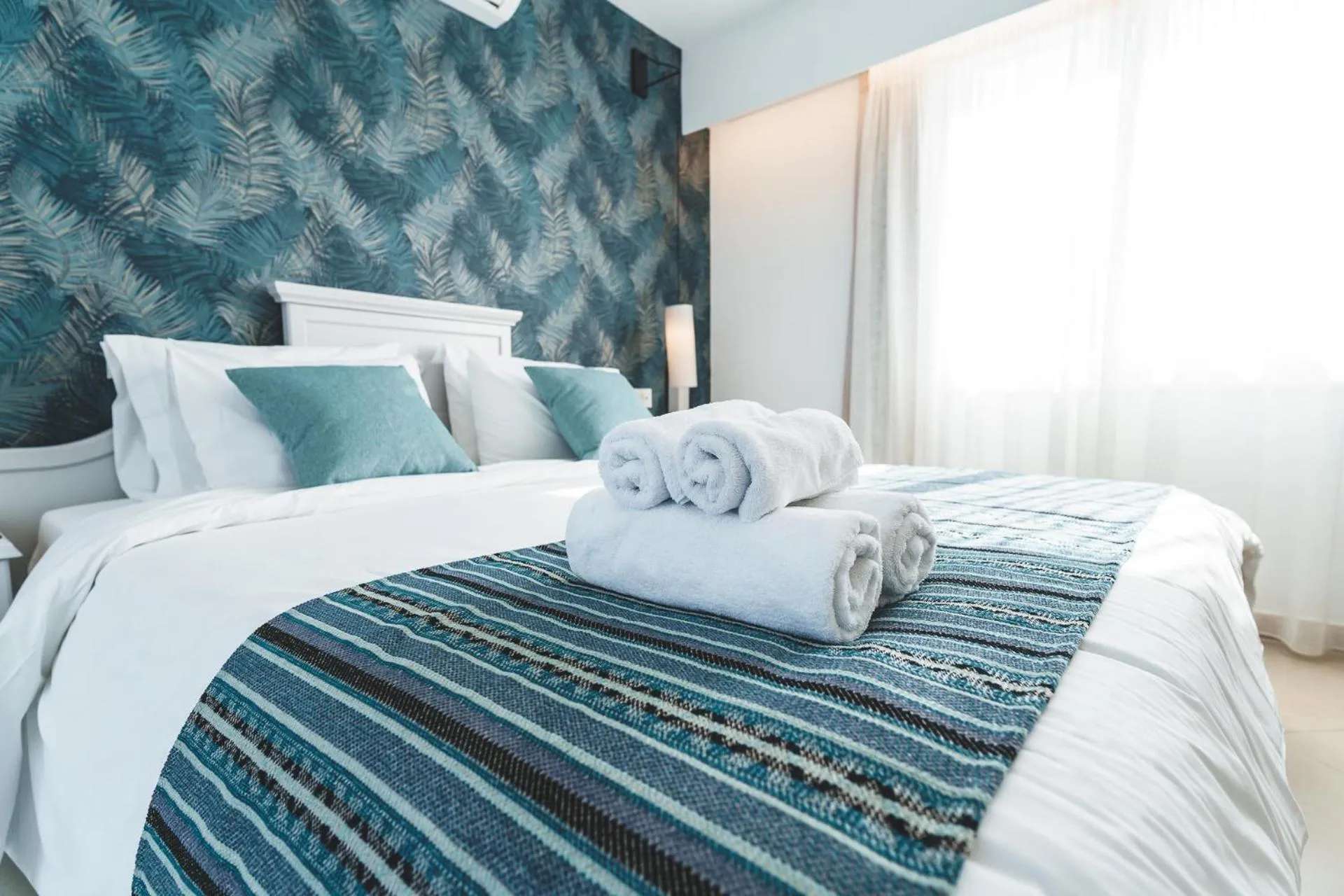 Bed in Zeus Village Resort - Adults Only