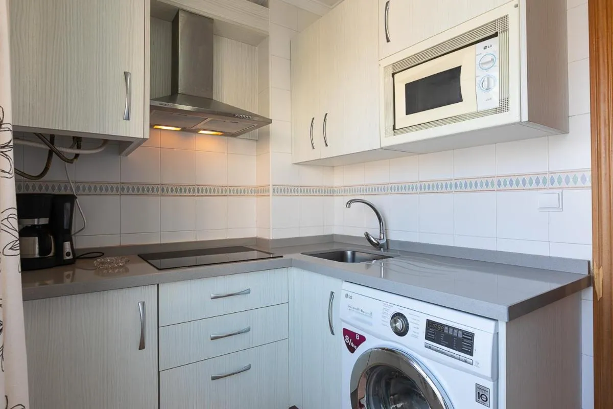 Kitchen or kitchenette in Apartamentos Guerrero