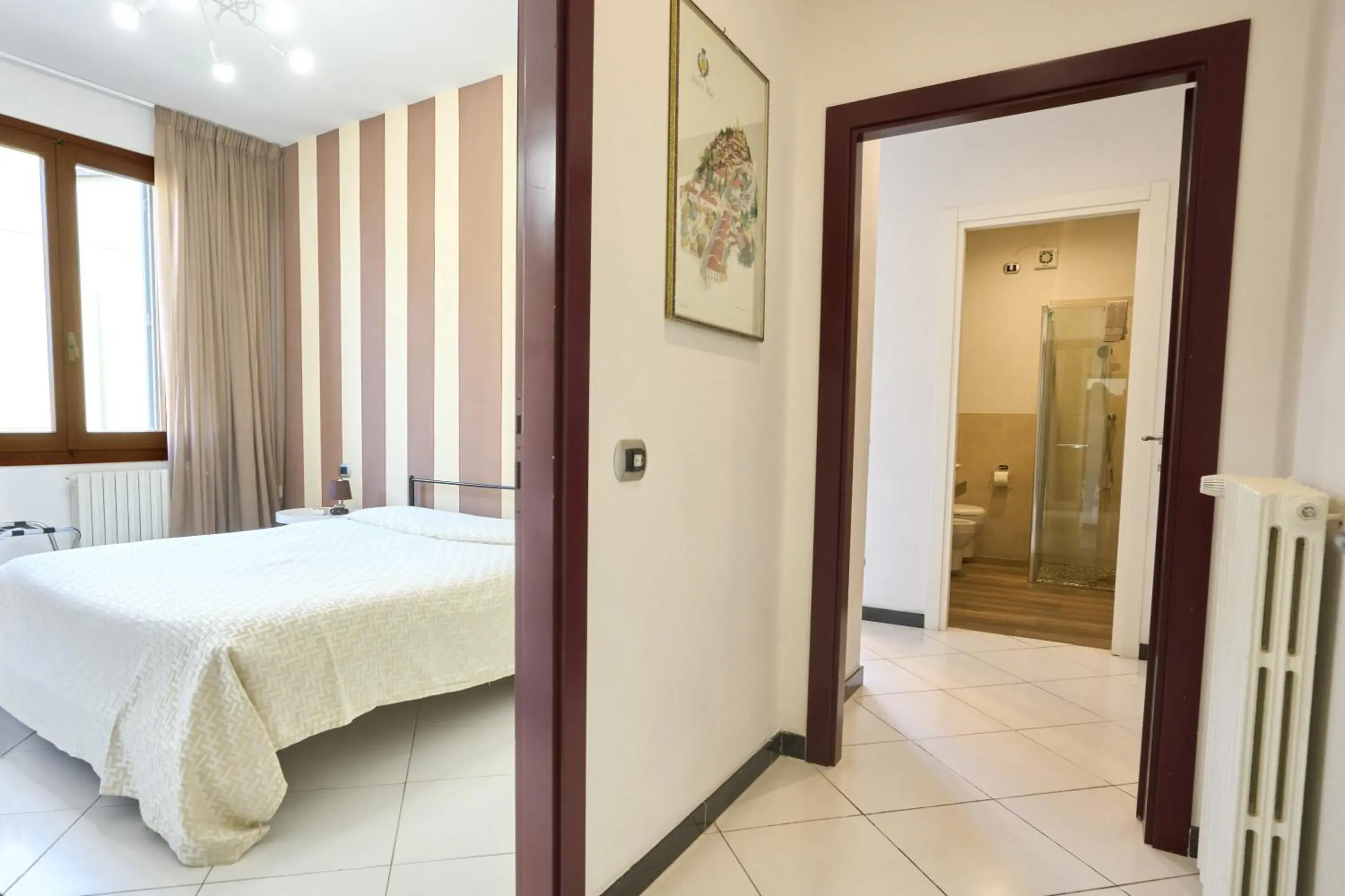 Deluxe Quadruple Room - single occupancy in Il Fiore di Monnalisa Deluxe Quadruple Room - single occupancy in Il Fiore di Monnalisa