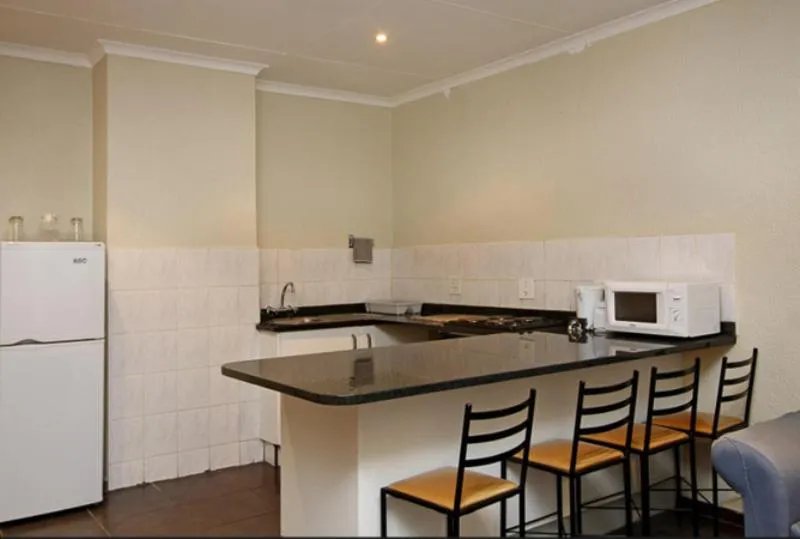 Kitchen or kitchenette in Vetho 2 Apartments OR Tambo Airport