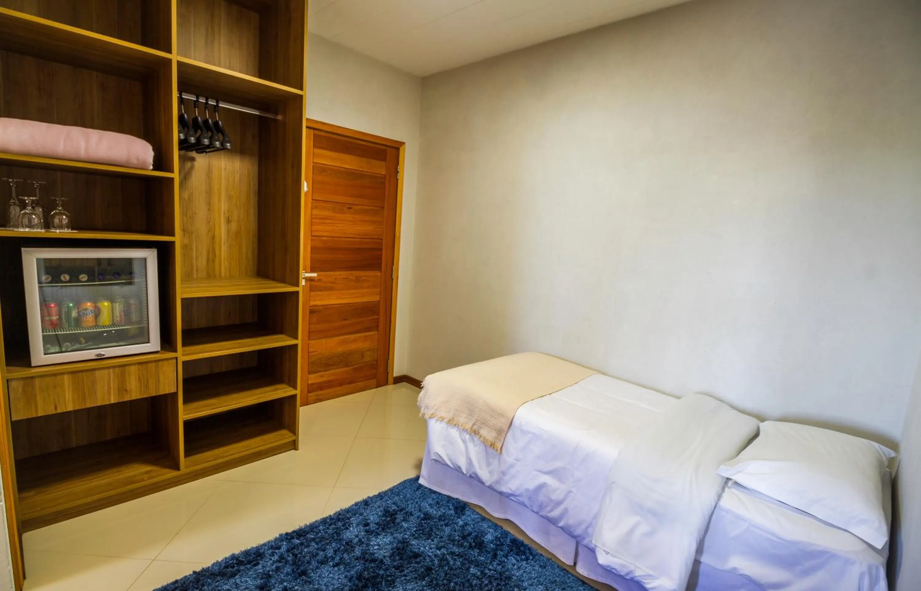 Photo of the whole room, Bed in Pousada Suiça Mineira Centro