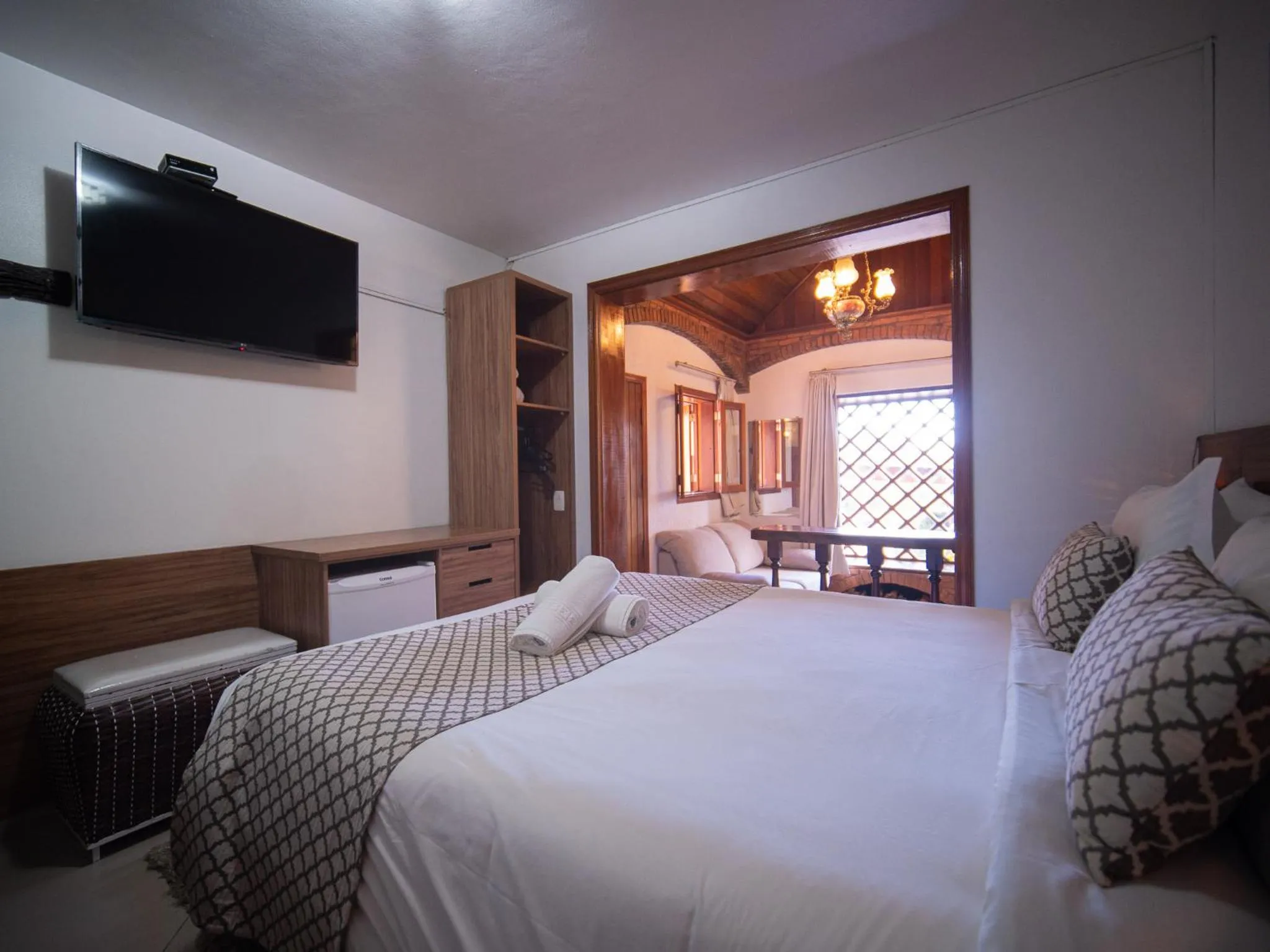 TV and multimedia, Bed in Pousada Suiça Mineira Centro