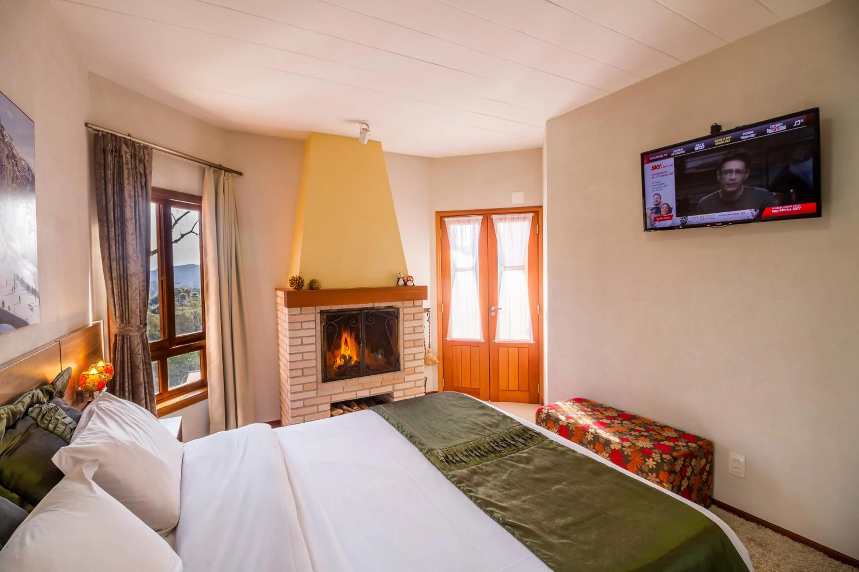 TV and multimedia, Bed in Pousada Suiça Mineira Centro