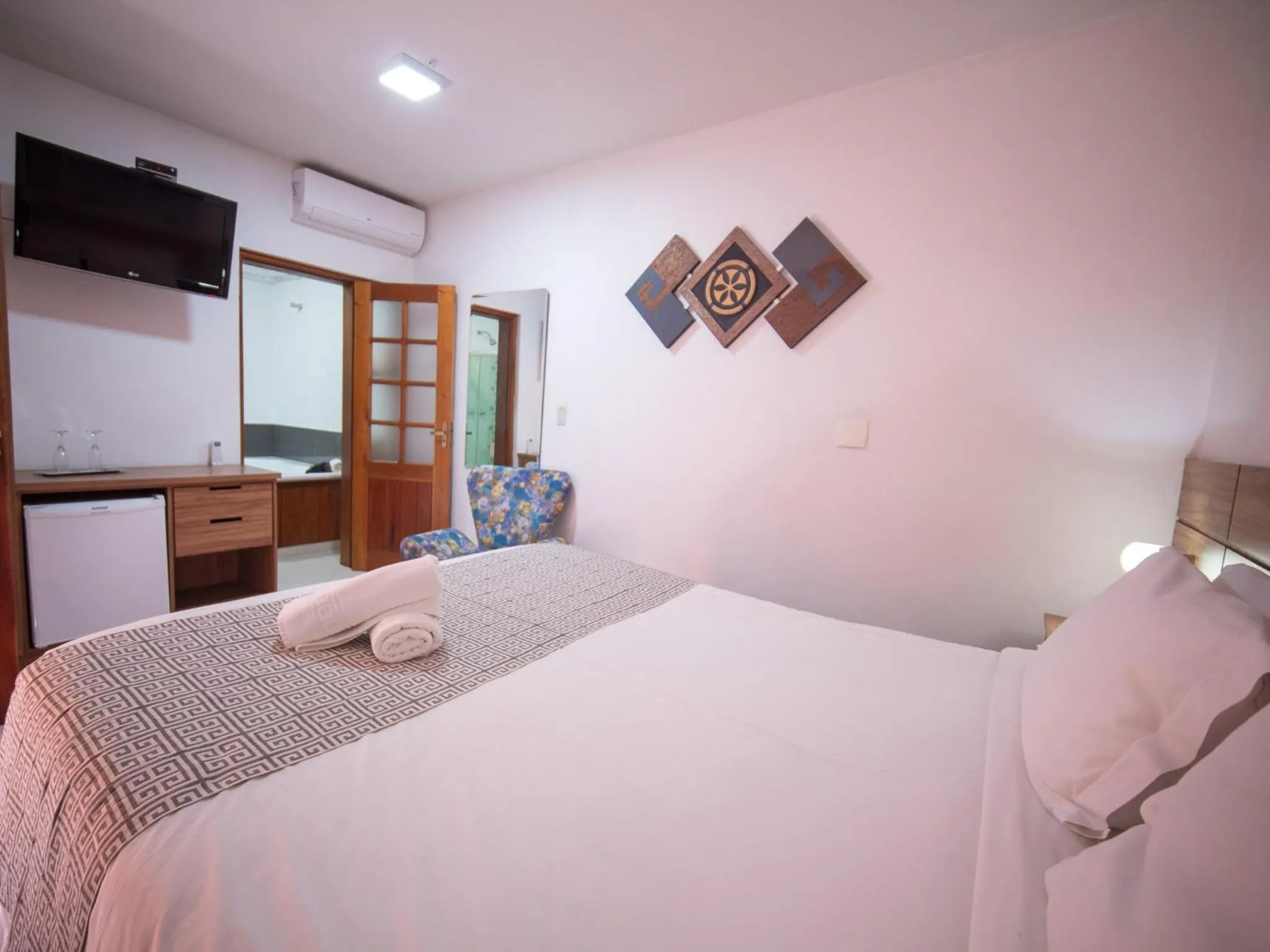 Bed in Pousada Suiça Mineira Centro