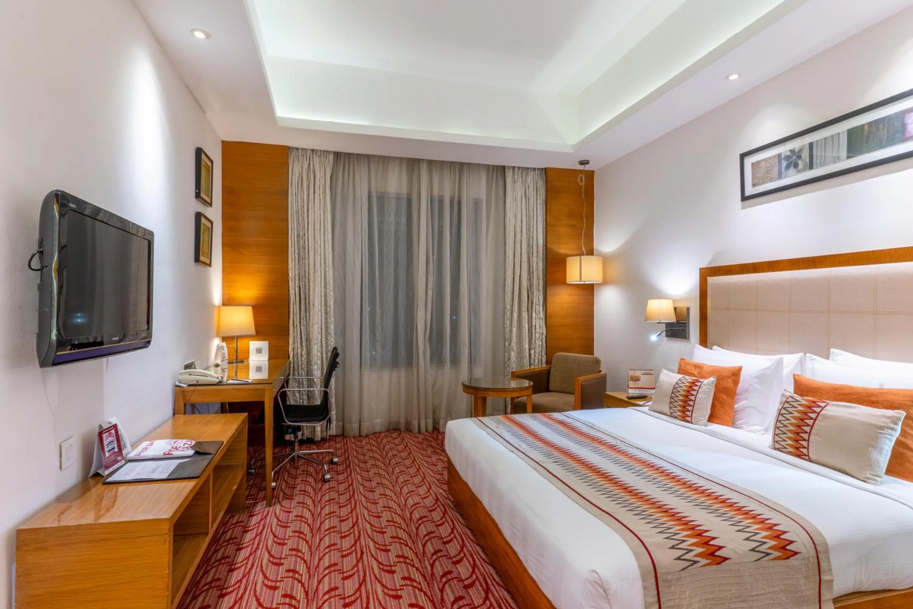 Bed in Pride Plaza Hotel, Kolkata