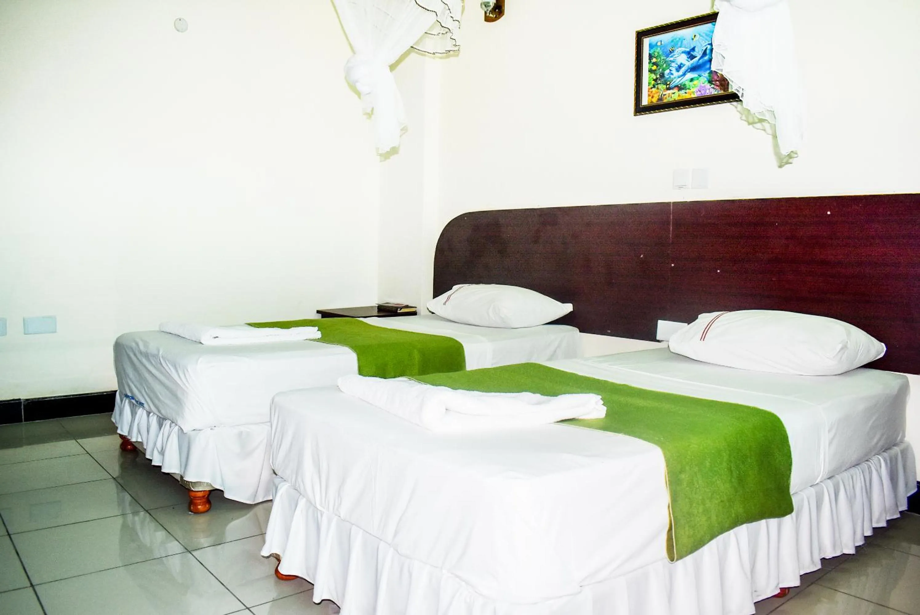 Photo of the whole room, Bed in Sheratton Regency Hotel