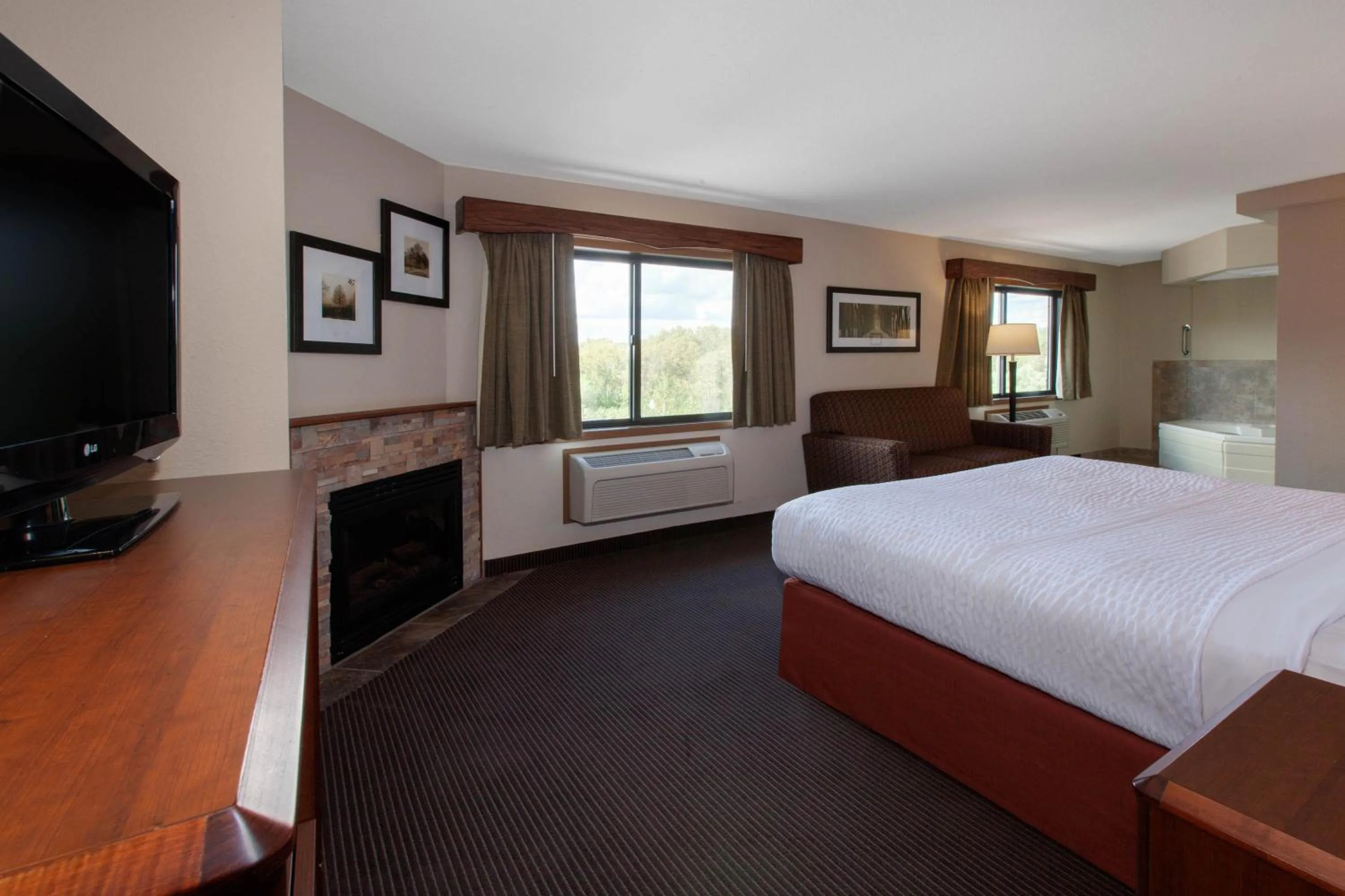 Photo of the whole room, Bed in AmericInn by Wyndham Iron River