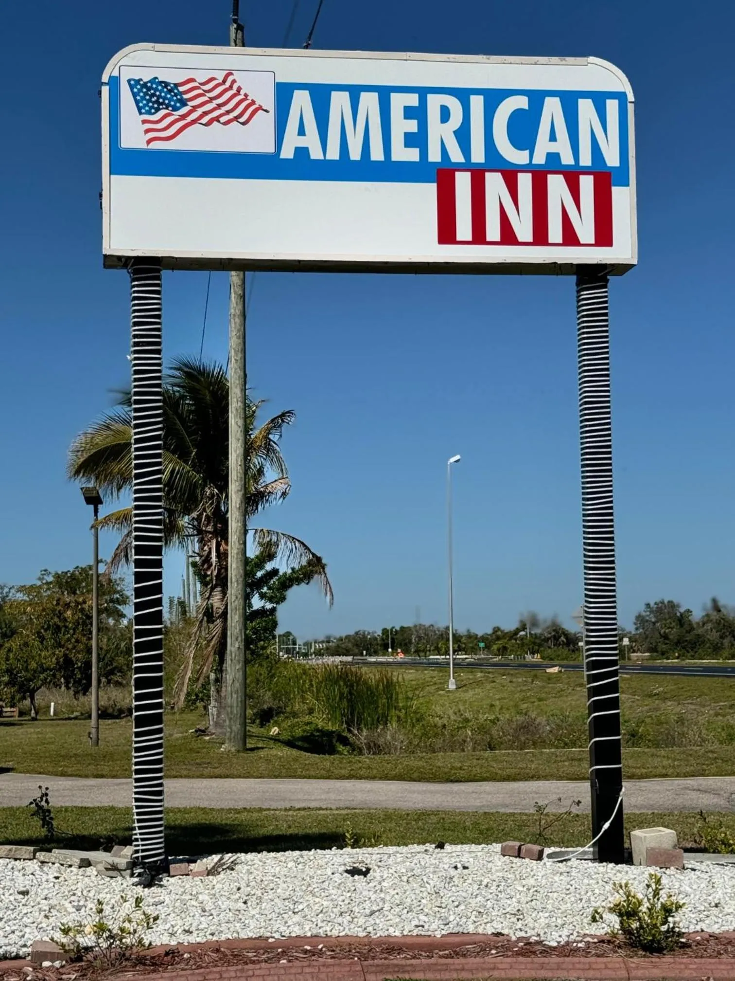 Logo/Certificate/Sign in American Inn Punta Gorda