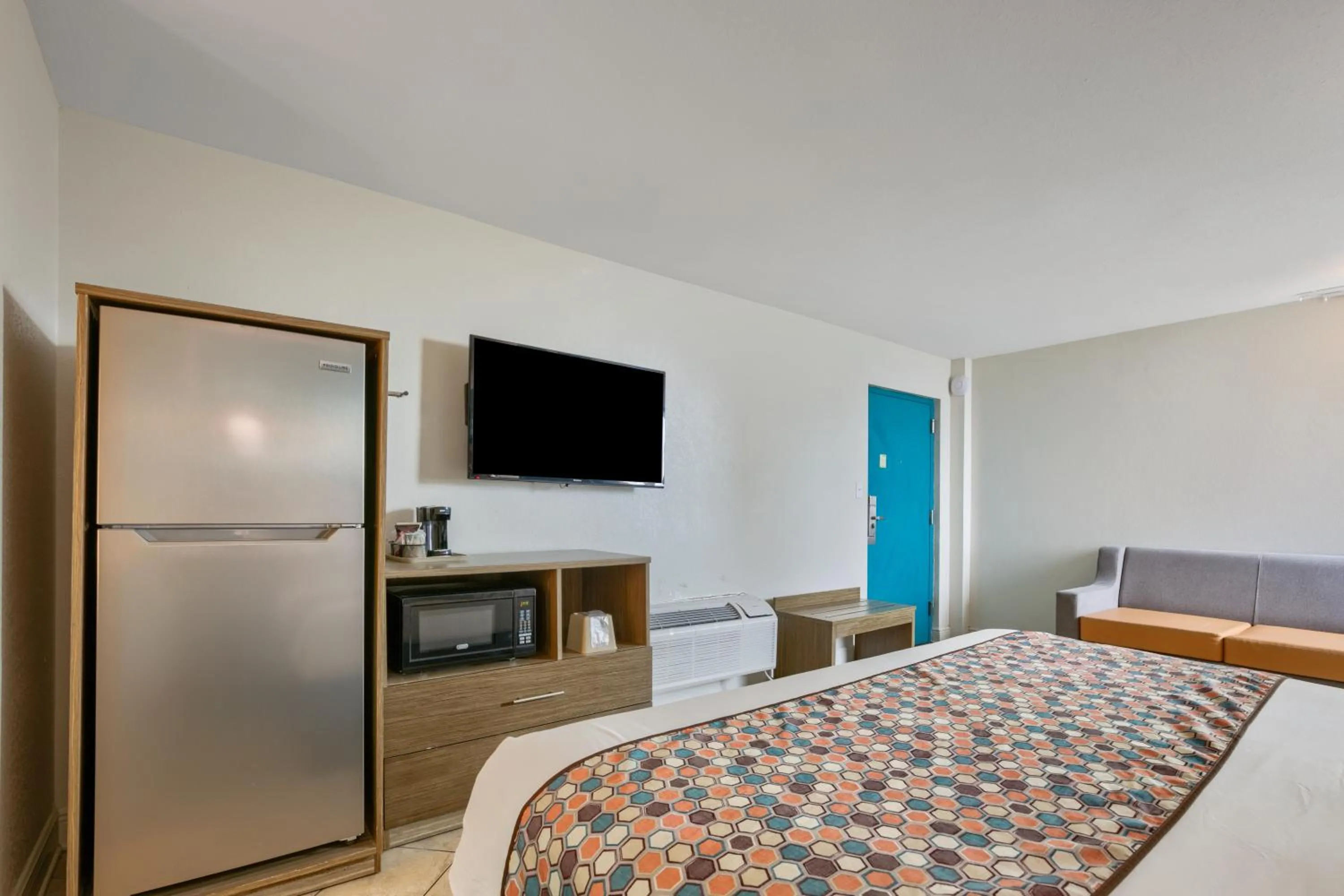 TV and multimedia, Bed in Beachside Resort Hotel