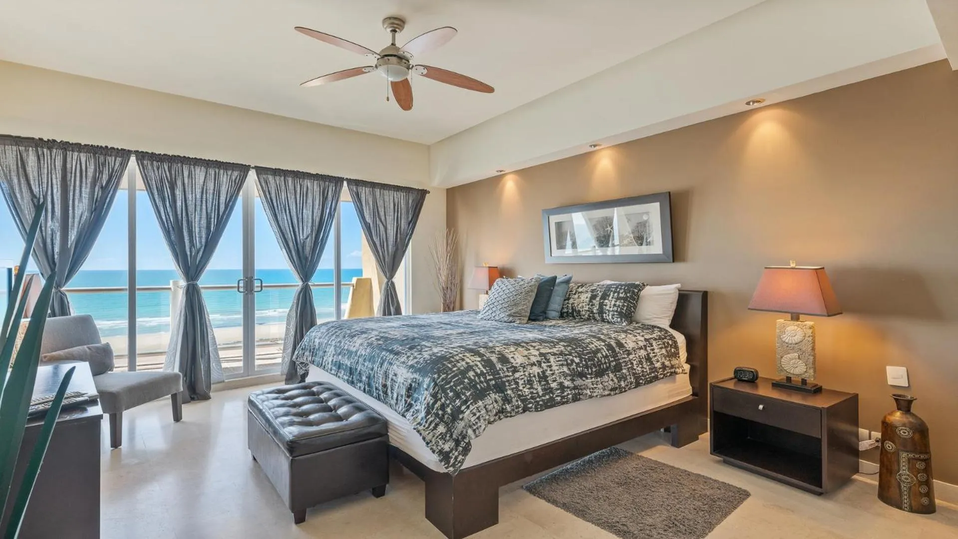 Photo of the whole room, Bed in Encanto Living Two Bedroom Unit by Kivoya