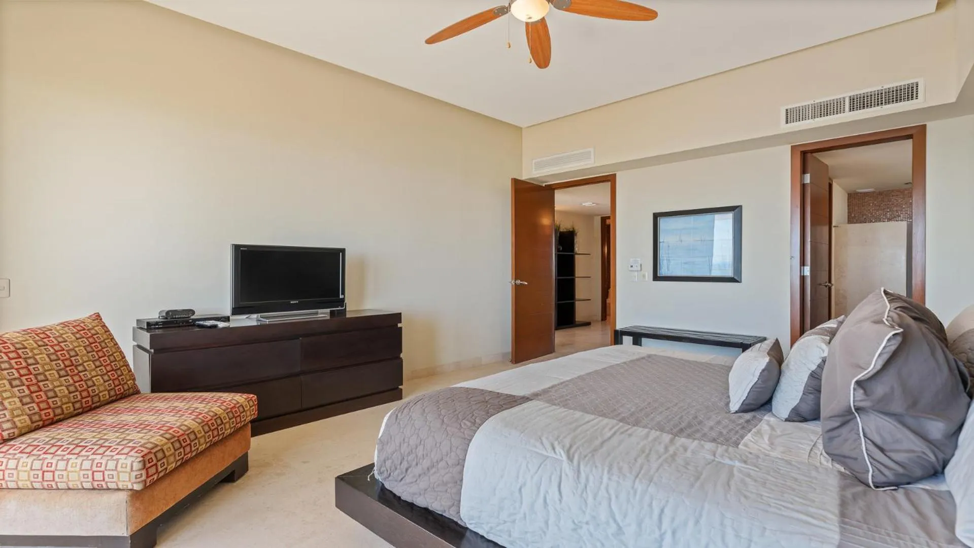 Photo of the whole room, Bed in Encanto Living Two Bedroom Unit by Kivoya