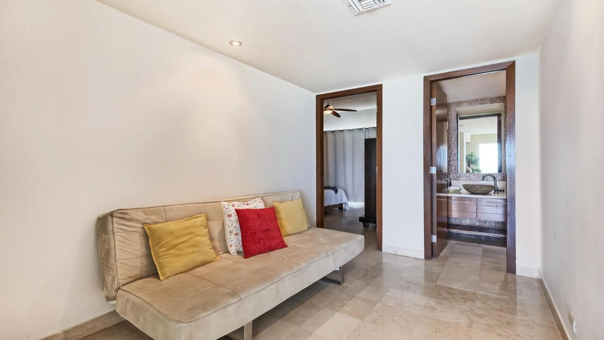 Bed in Encanto Living Two Bedroom Unit by Kivoya