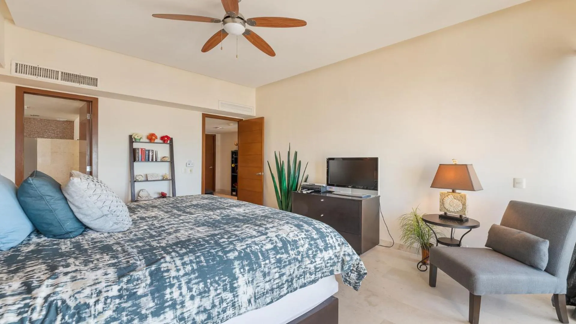 Photo of the whole room, Bed in Encanto Living Two Bedroom Unit by Kivoya