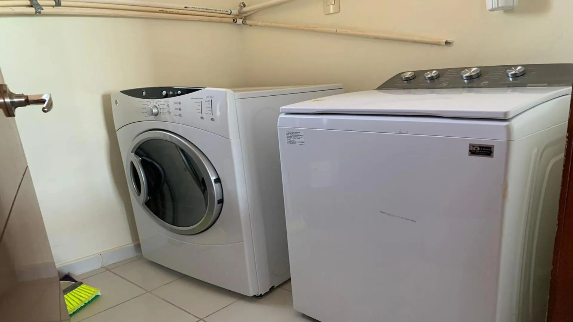 washing machine in Encanto Living Two Bedroom Unit by Kivoya
