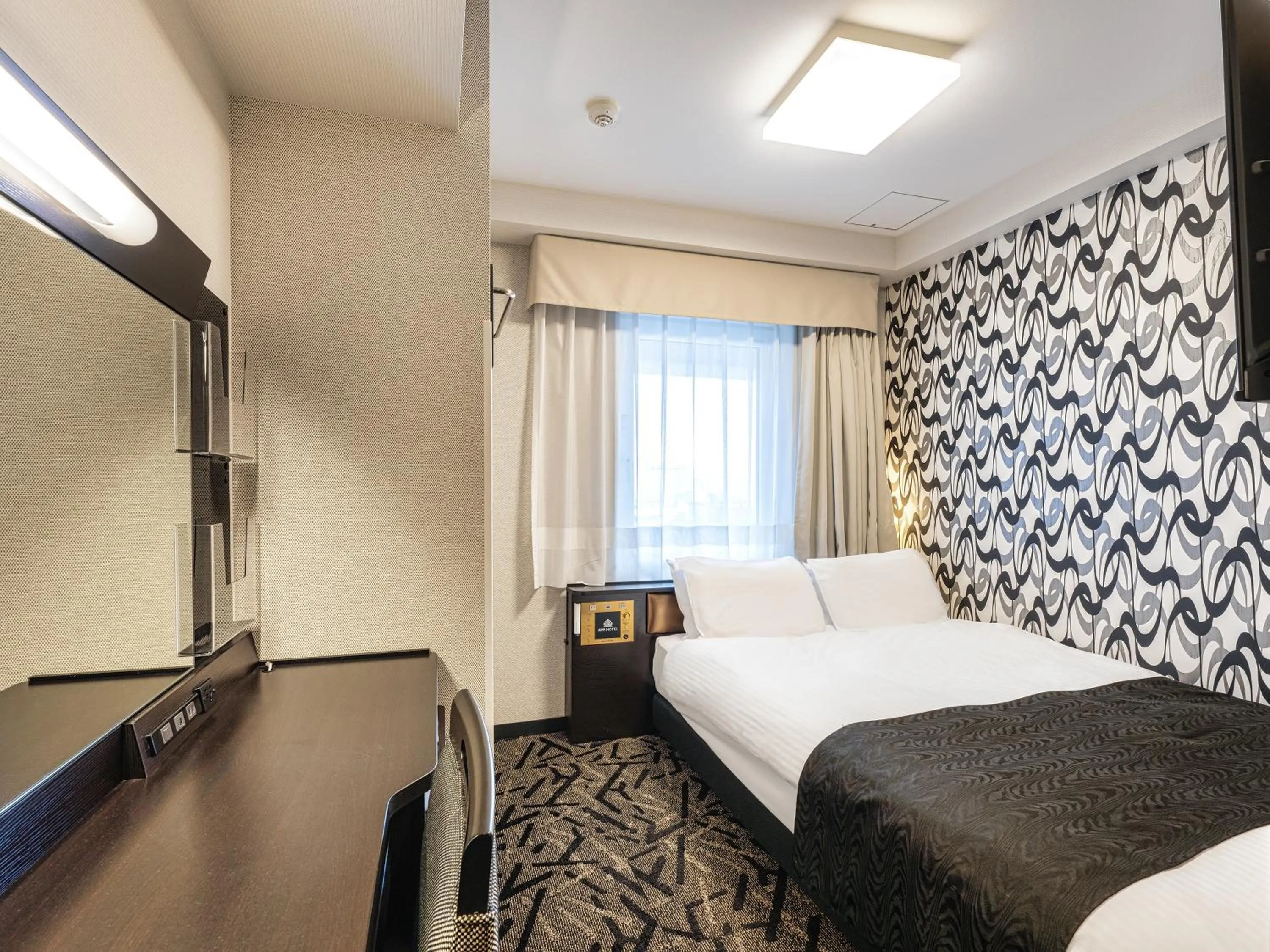 Photo of the whole room, Bed in APA Hotel Niigata Tsubamesanjo Ekimae