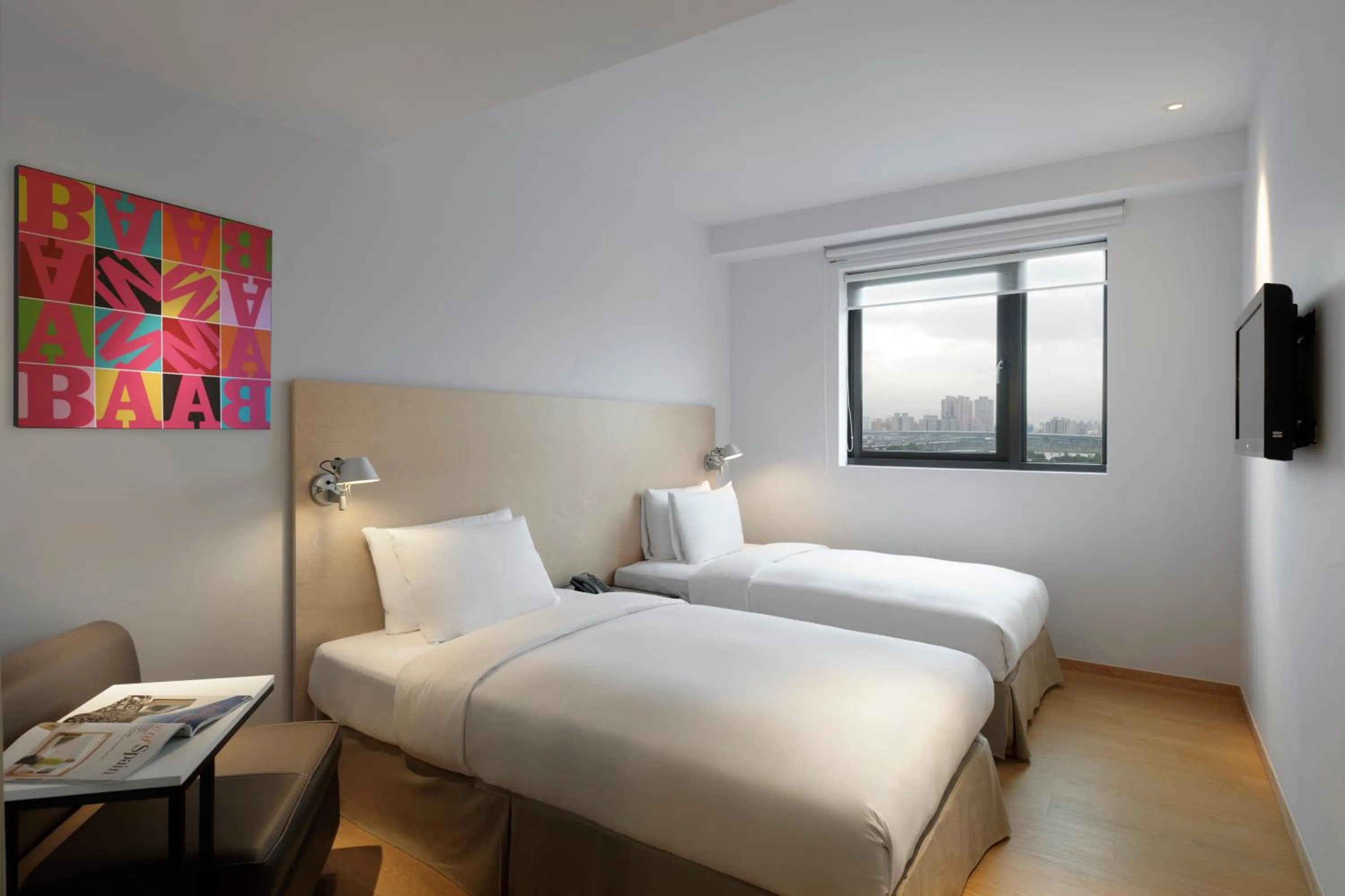 Bed in amba Taipei Ximending