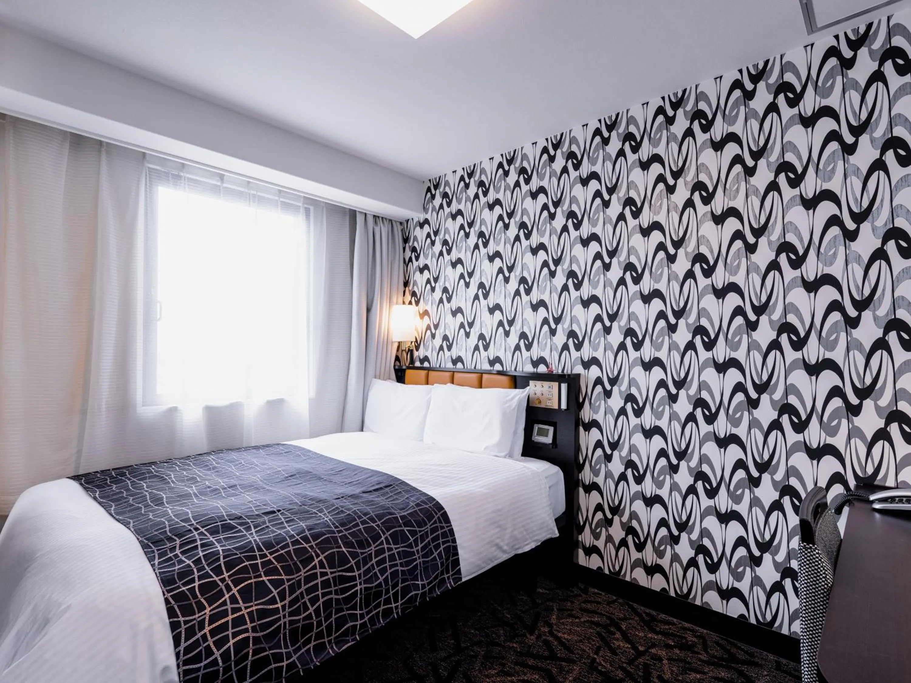 Photo of the whole room, Bed in APA Hotel Saga Ekimae Chuo