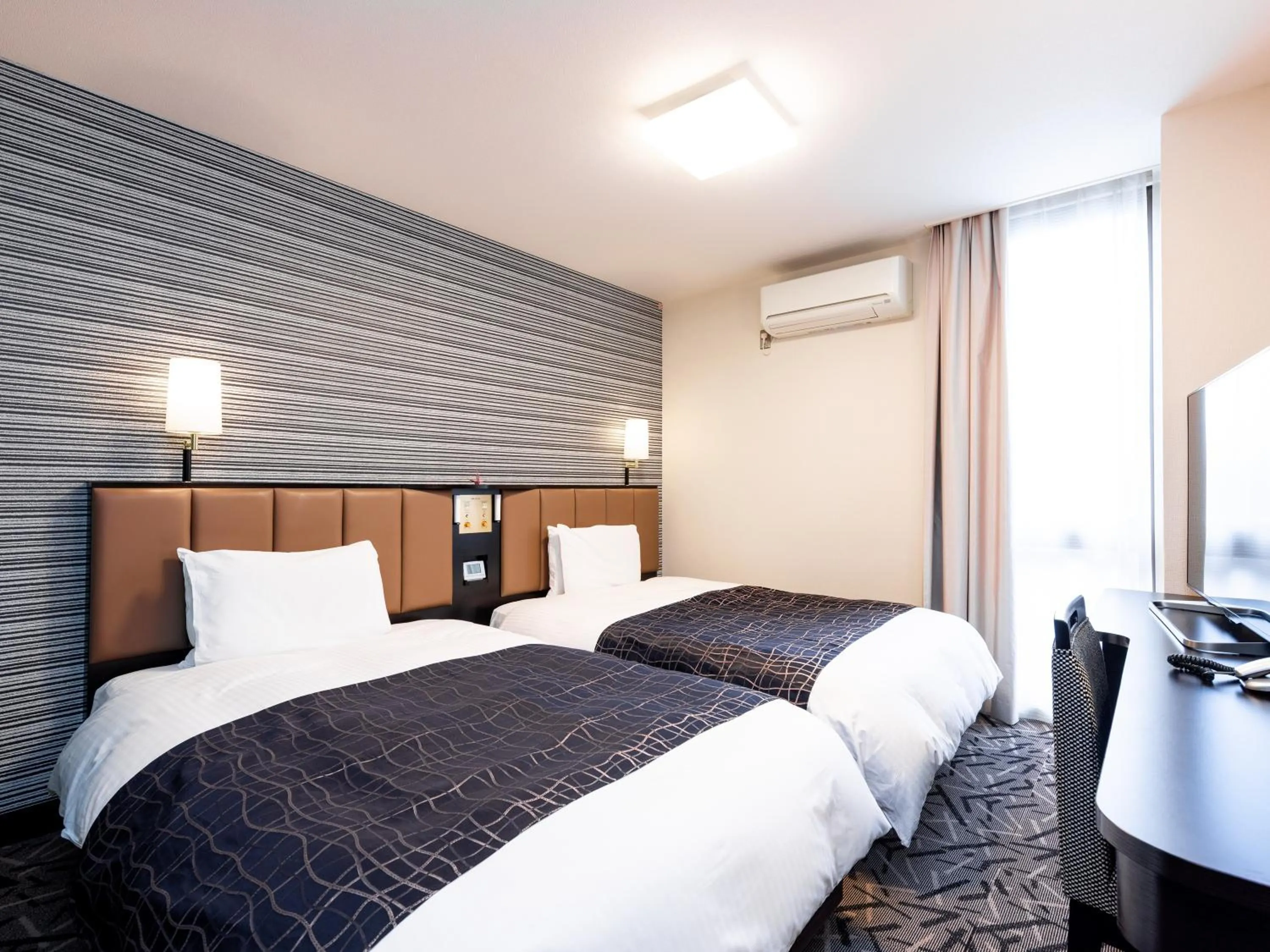 Photo of the whole room, Bed in APA Hotel Saga Ekimae Chuo